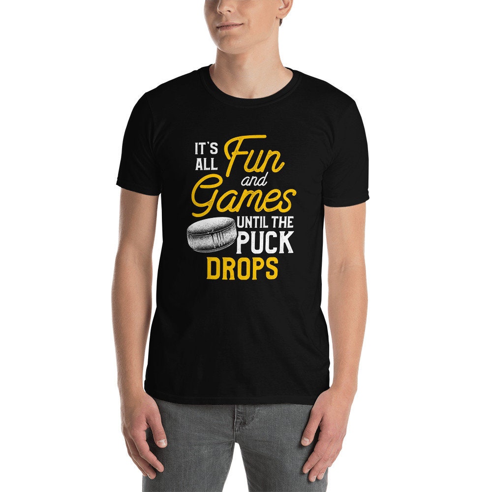 Funny Hockey Sport Quote quotIt39s All Fun And Games Until The Puck Dropsquot T Shirt Graphic Tee – Aesthetic Look · High-Quality Print