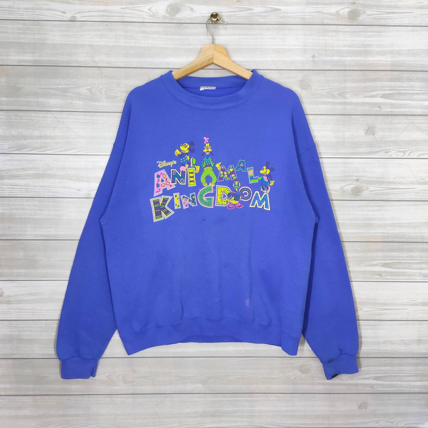 Disney Animal Kingdom Crewneck Large Vintage Cartoon Sweatshirt Jumper Pullover Blue Size L Sweatshirt – Soft Feel · Must-Have Style