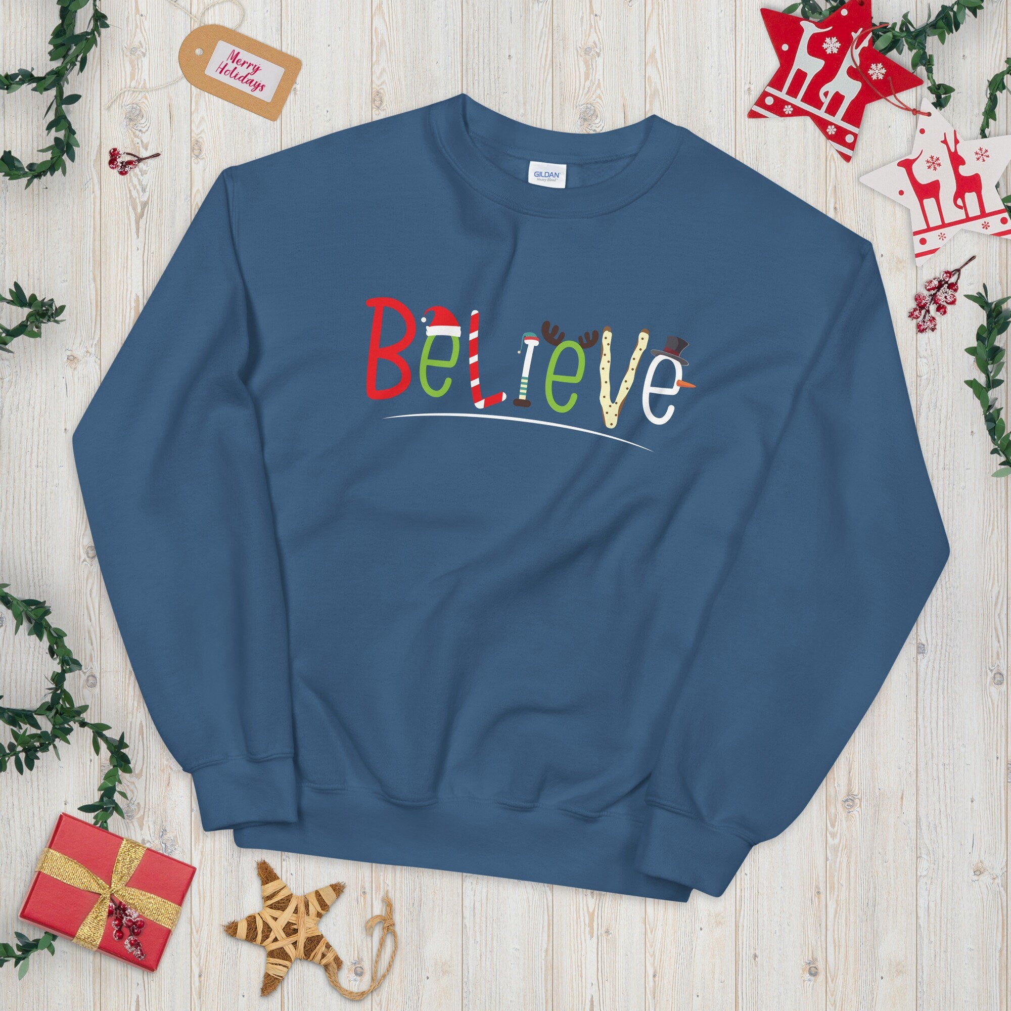 Festive Theme Believe Unisex Sweatshirt Sweatshirt – Cozy Vibes · Trending Graphic Apparel