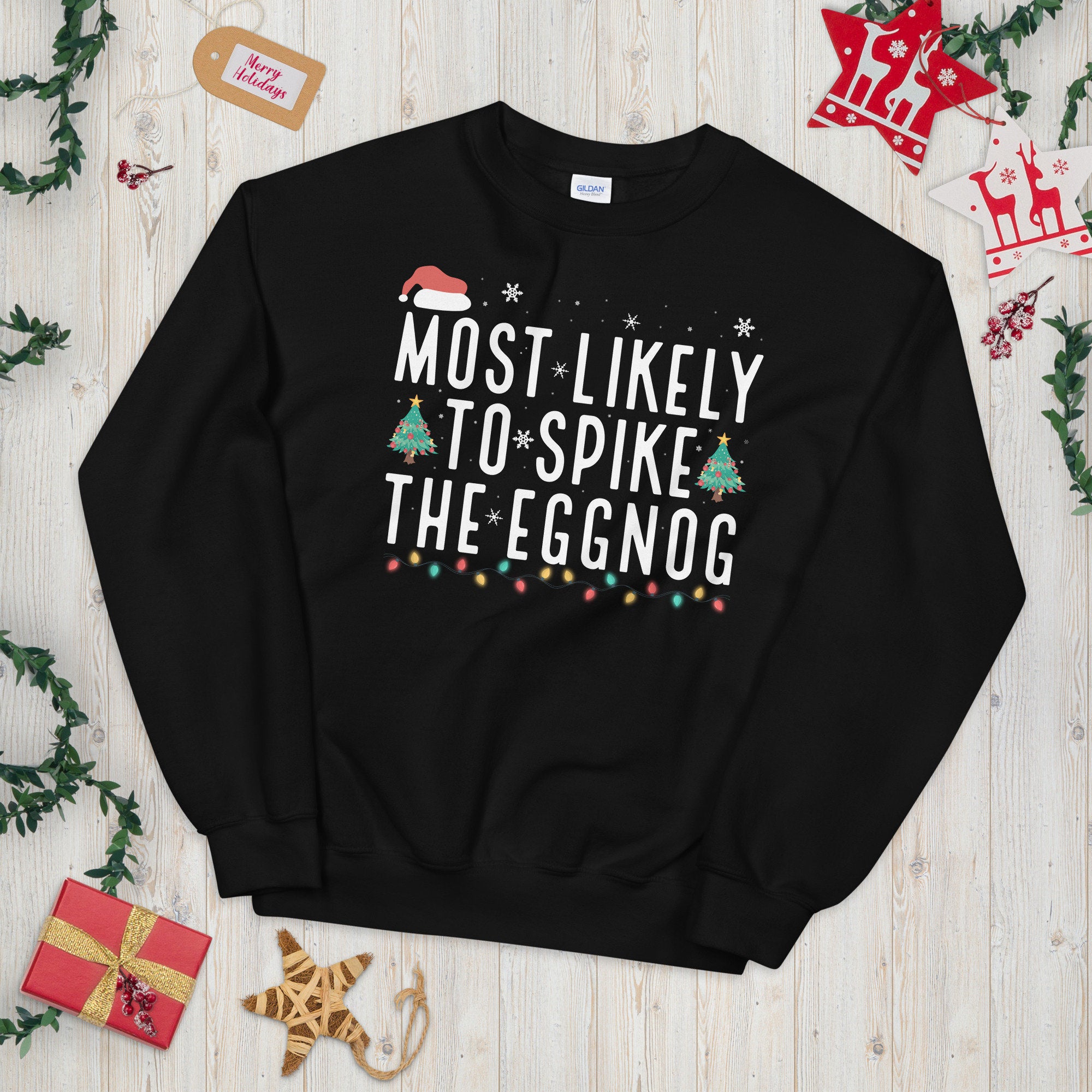 Most Likely to Spike the Eggnog Unisex Sweatshirt Sweatshirt – Cozy Vibes · Great Gift For Fans