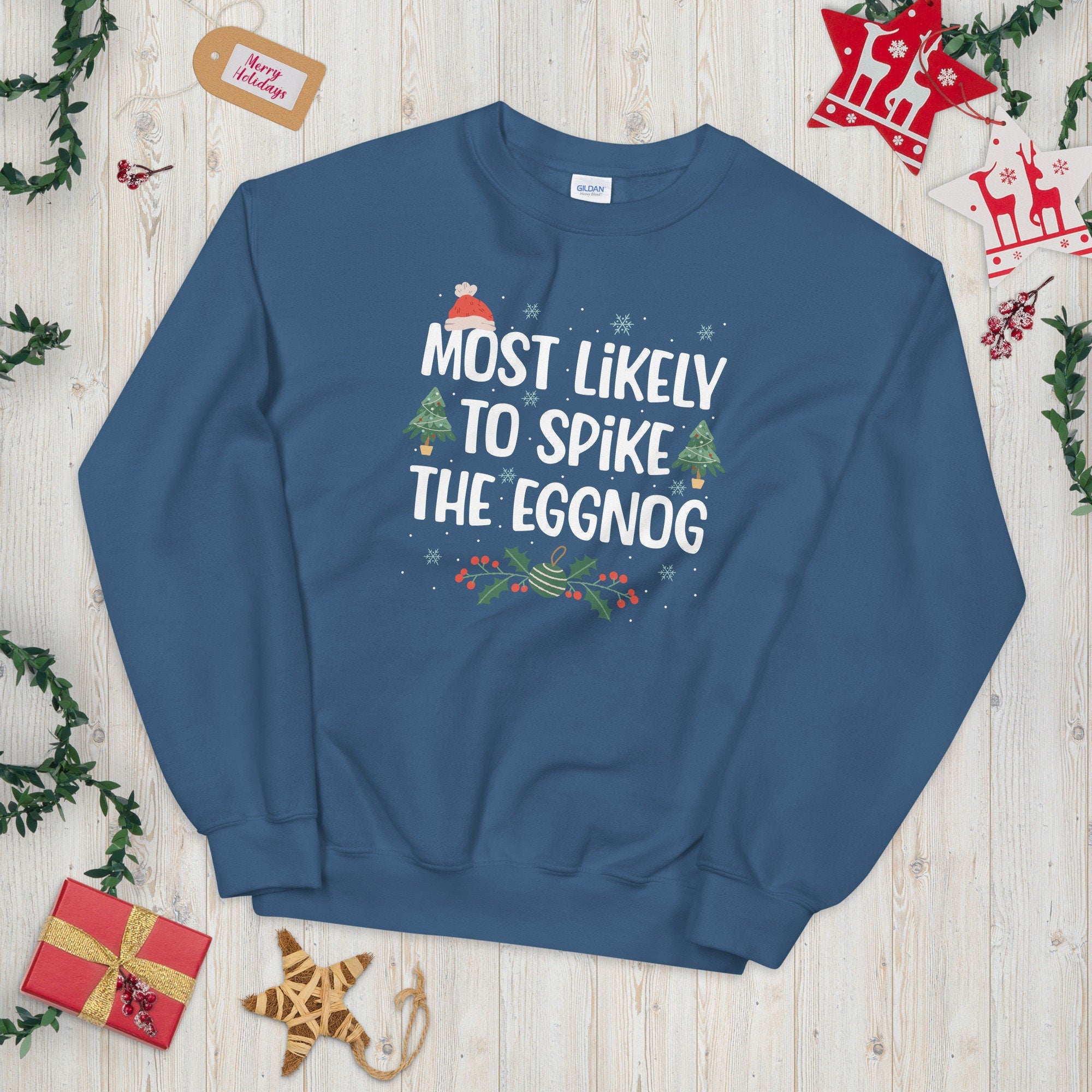 Most Likely to Spike the Eggnog Festive Unisex Sweatshirt Sweatshirt – Fan Favorite · Trending Graphic Apparel