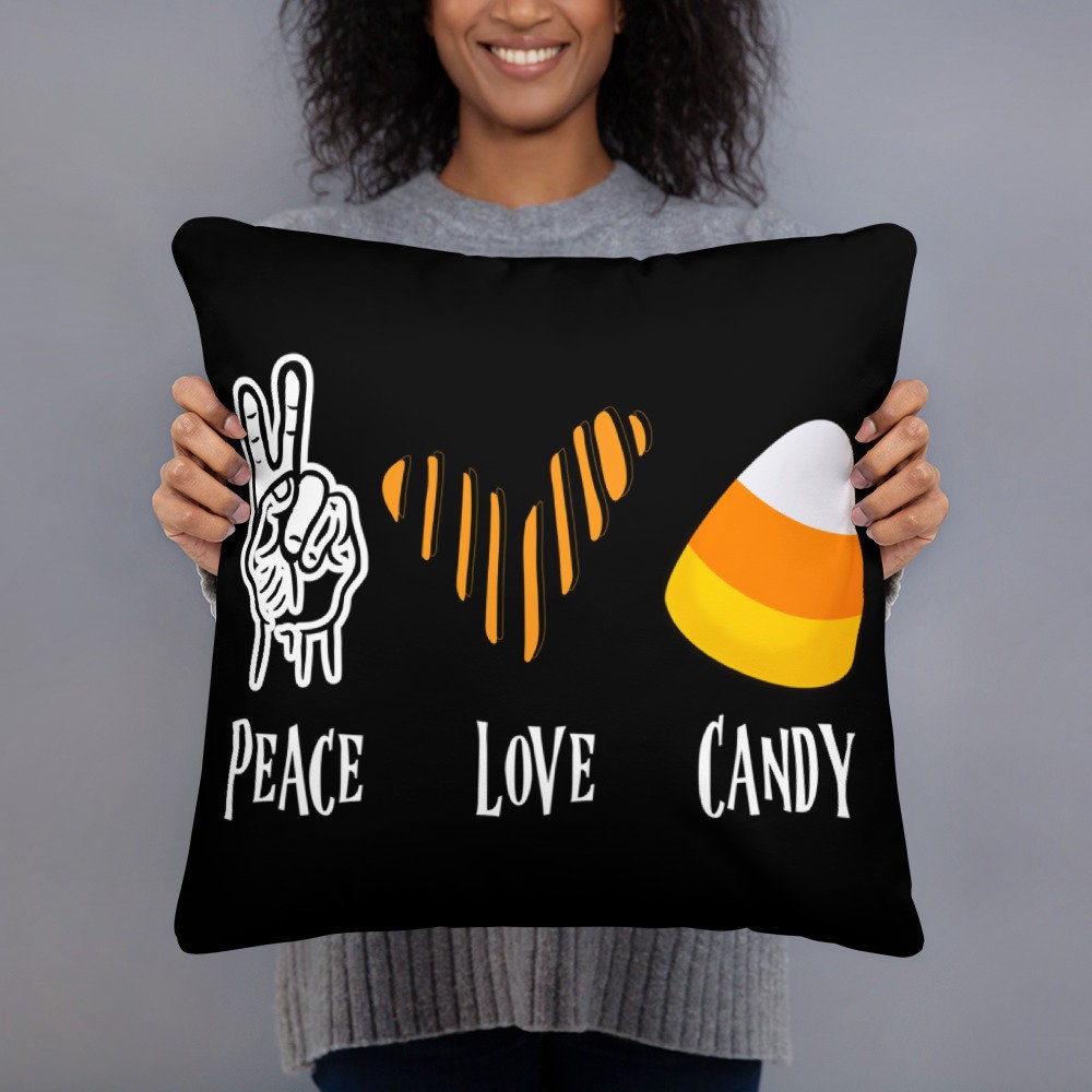 Peace Love Candy Corn Halloween Basic Pillow Graphic Tee – Feel-Good Design · High-Quality Print