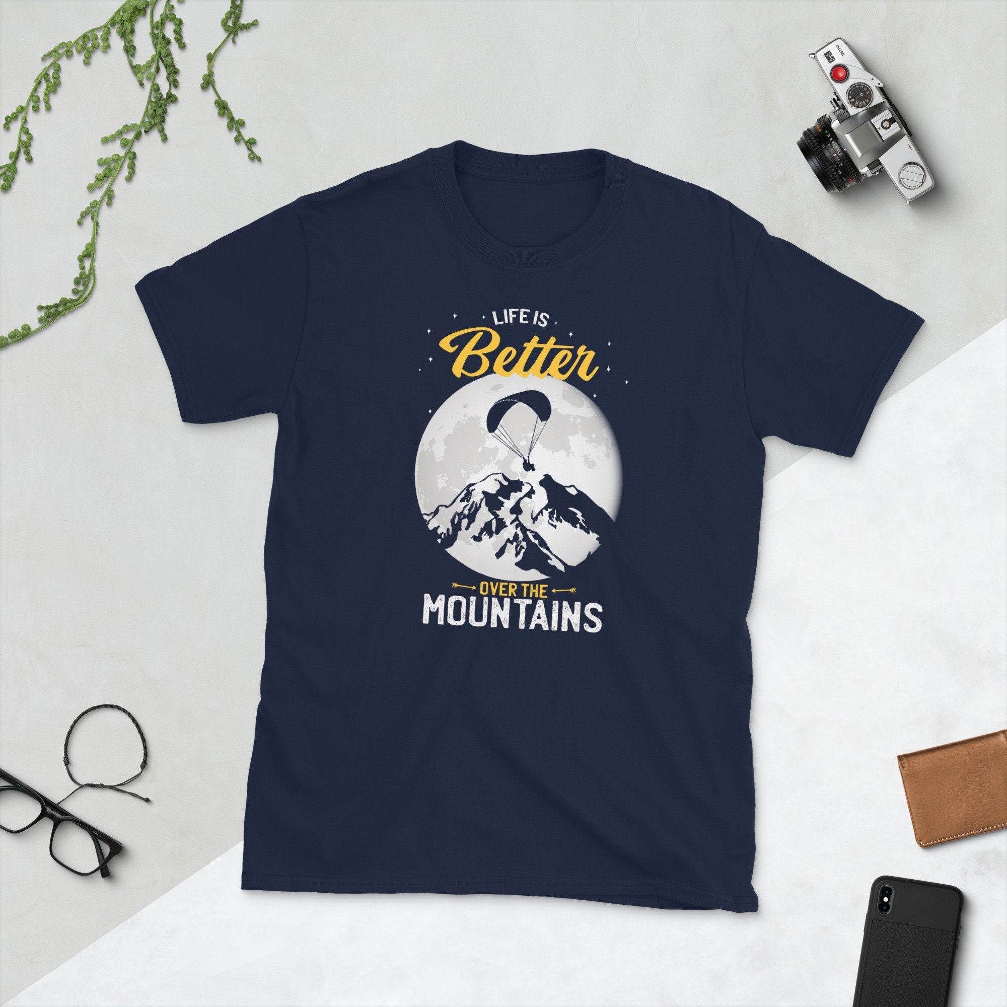 Life Is Better Over The Mountains Paraglider Shirt Graphic Tee – Fan Favorite · Trending Graphic Apparel