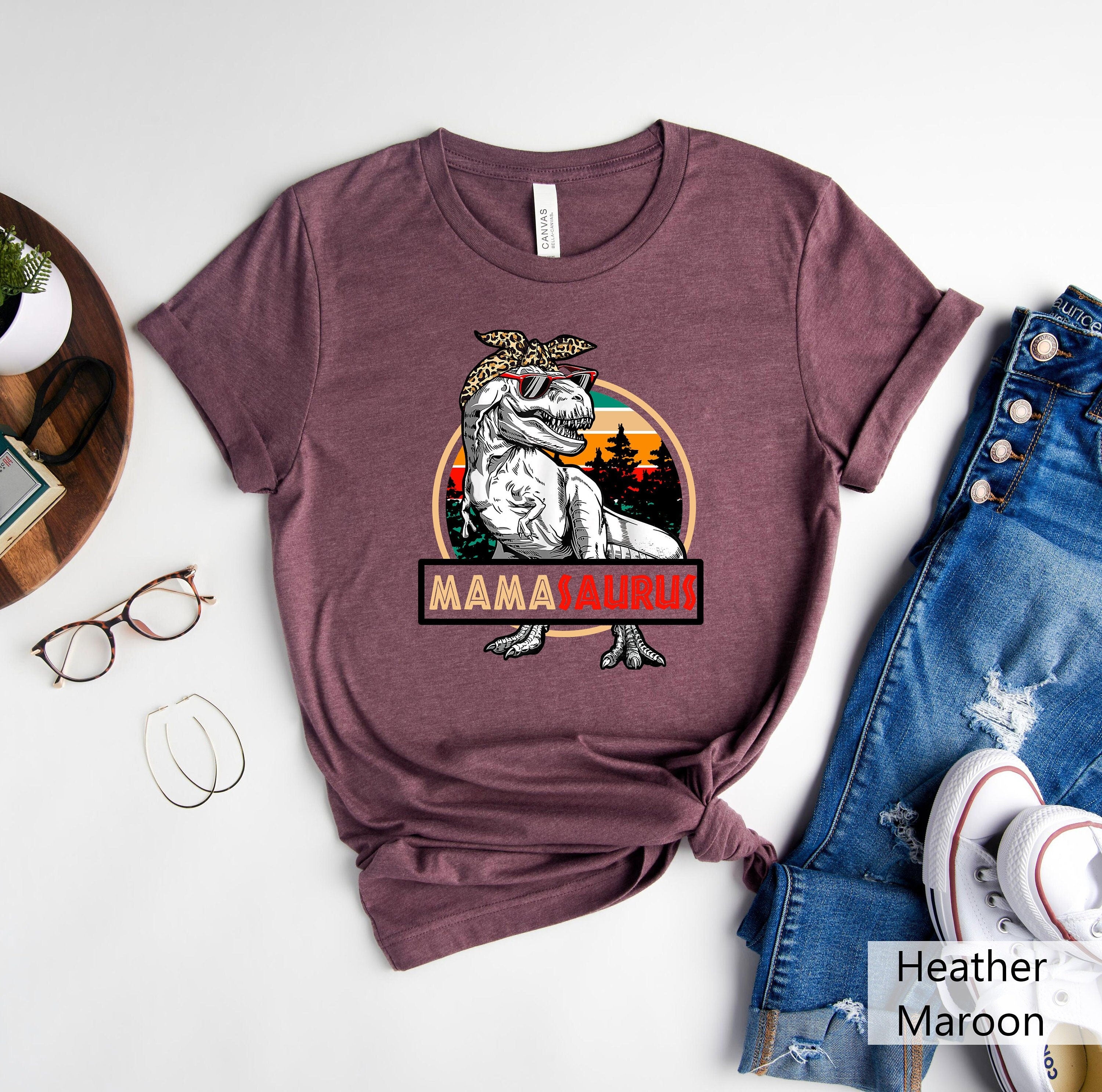 Mama Saurus Shirt Dinosaur Mom Shirt Funny Mom Shirt Mom Life Outfit Mamasaurus Gift for MomMama Dinosaur Shirt Mama TeesMothers Day Graphic Tee – Cozy Vibes · Perfect For Daily Wear
