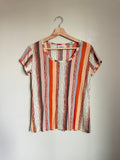 Vintage 7039s Lady Manhattan Orange Striped Top Graphic Tee – Warm & Stylish · High-Quality Print
