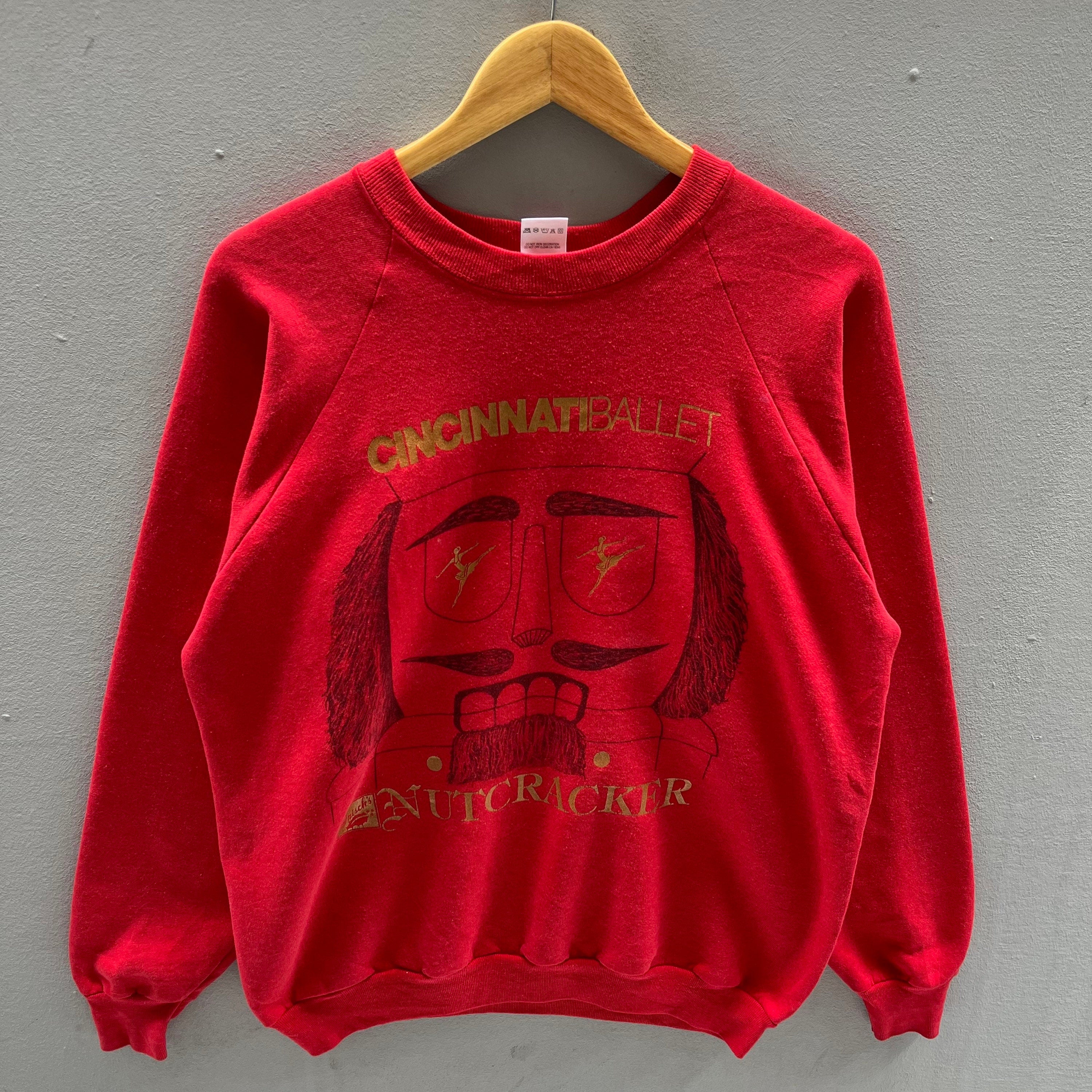 Vintage 90s Fruit Of The Loom Tag Cincinnati Ballet Nutcracker Spellout Biglogo Printed Sweatshirt Crewneck Colour Red Size X Large Sweatshirt – Easygoing Wear · High-Quality Print