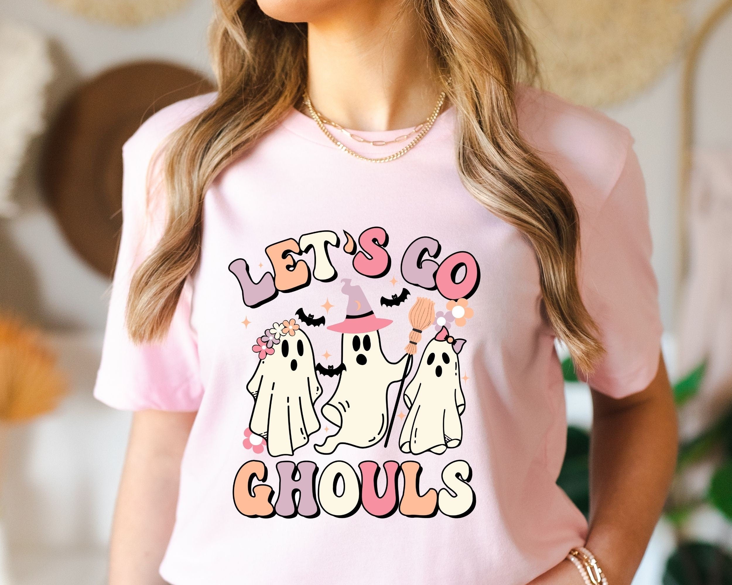 Lets Go Ghouls Shirt Spooky Season Tee Vintage Halloween Shirt Retro Halloween Cowgirl Shirt Cowgirl Halloween ShirtVintage Ghost Shirt Graphic Tee – Aesthetic Look · High-Quality Print