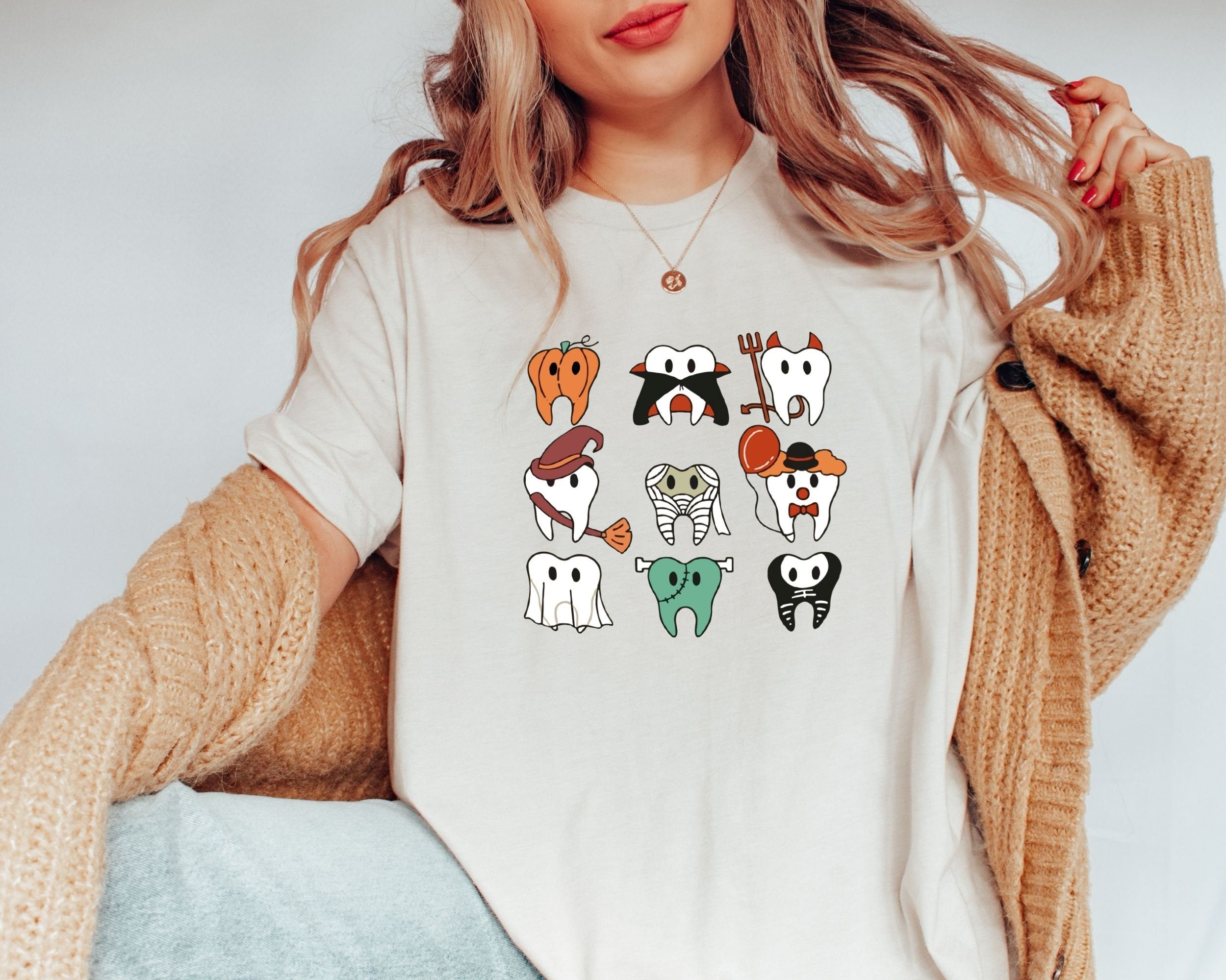 Funny Halloween Teeth T Shirt Spooky Halloween Dentist Shirt Funny Tee Dental Squad Shirt Trick or Teeth TeeGhost ShirtWitch Tooth Tee Graphic Tee – Feel-Good Design · Perfect For Daily Wear