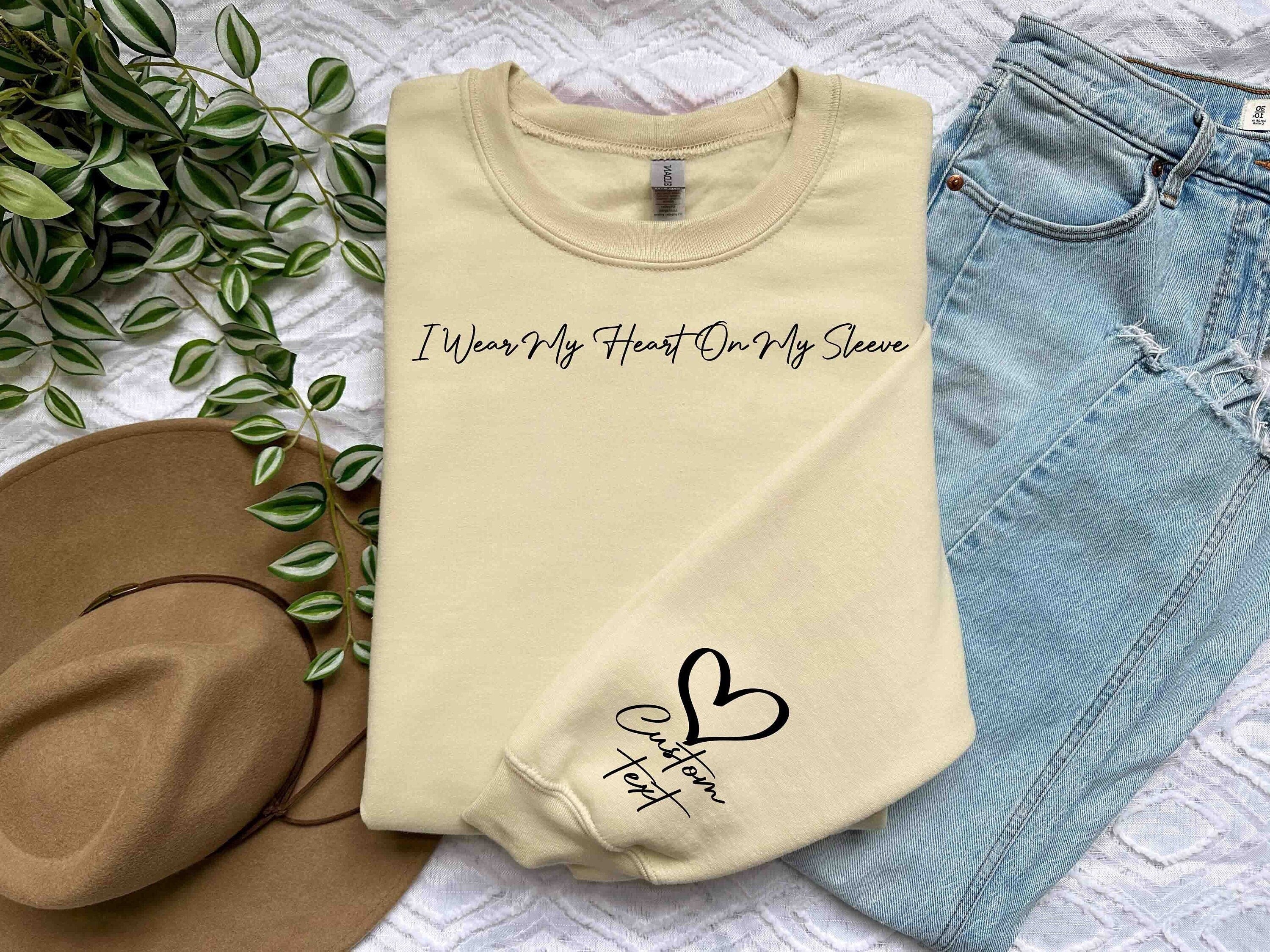 I Wear My Heart On My Sleeve Sweatshirt Gift For Mom Custom Sleeve Print Sweatshirt Personalized Sleeve Names Hoodie New Mommy Sweater Hoodie – Aesthetic Look · High-Quality Print