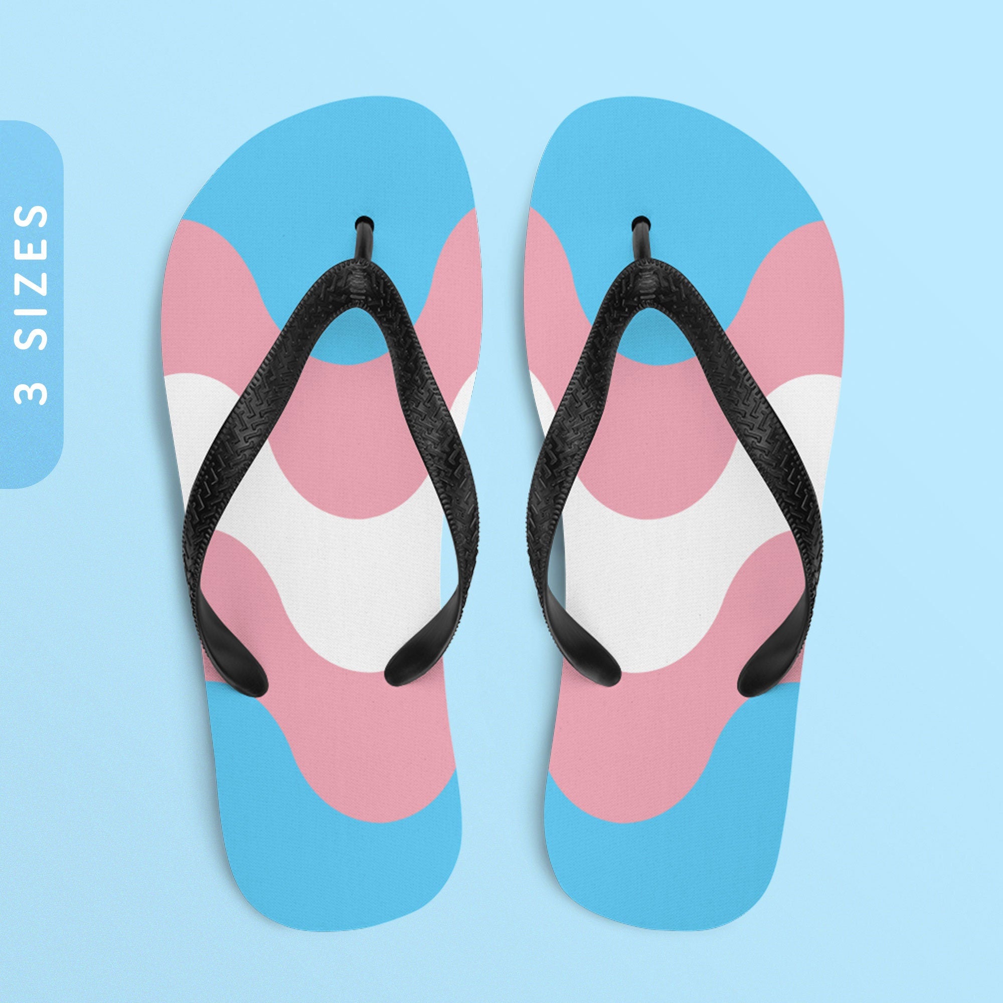 Subtle Trans Pride Waves Flip Flops All Over Print Beach Sandals Trans Pride Flag Color Flip Flops Transgender Flag Flip Flops Graphic Tee – Soft Feel · Must-Have Style