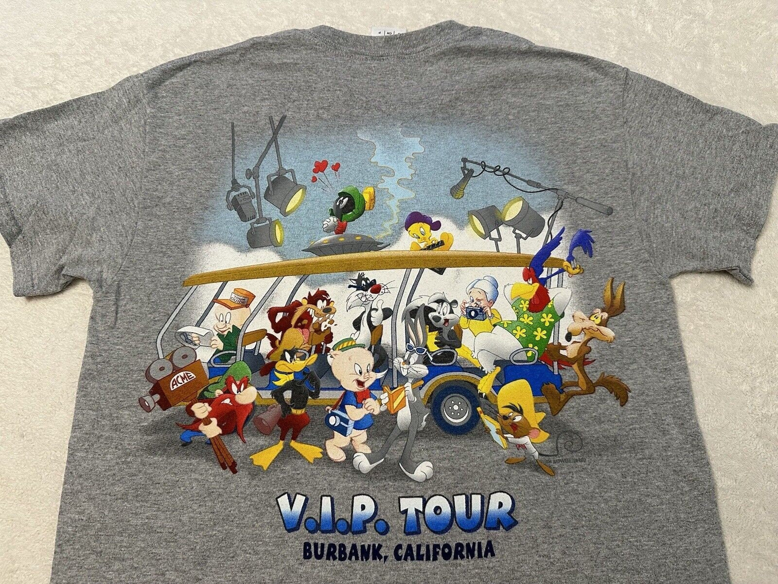 Vintage 2000s Y2K Warner Bros Studios VIP Tour Cartoon Comic T Shirt S NEW Graphic Tee – Soft Feel · Trending Graphic Apparel