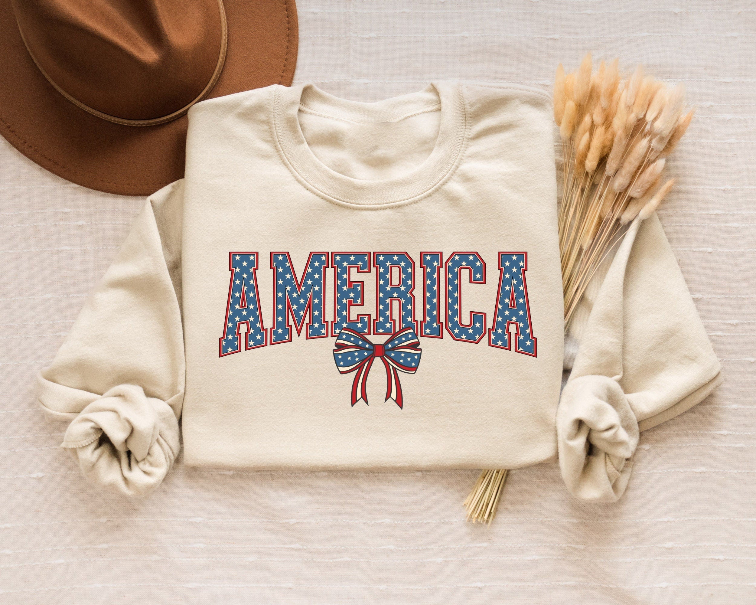 Coquette Bow American Flag Sweatshirt 4th of July Shirt 4th of July Shirt Independence Day Red White and Blue 4th of July Sweatshirt – Fan Favorite · Top Pick For Any Outfit