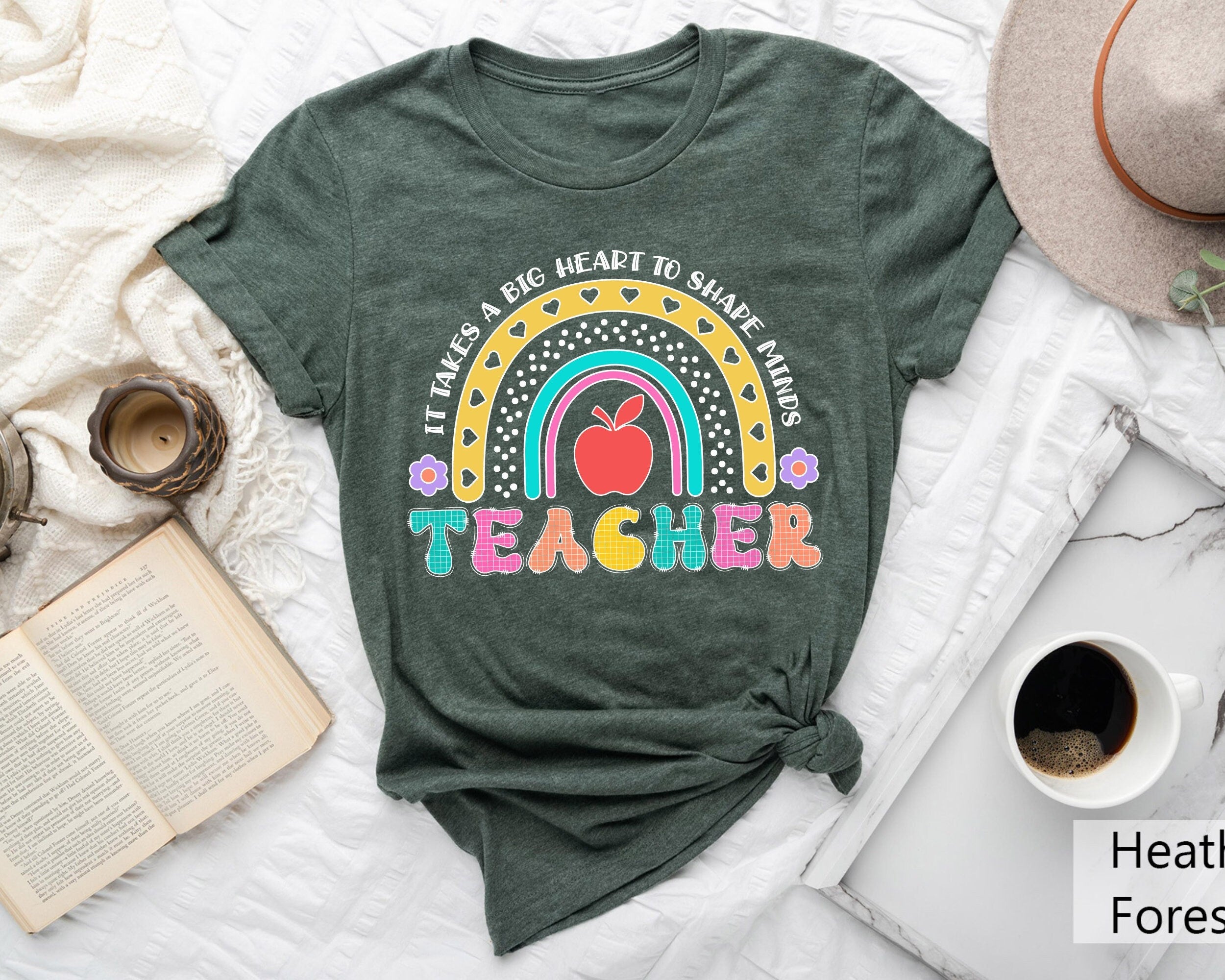 Teacher Shirt It Takes A Big Heart To Shape Little Minds Little Minds Teacher Appreciation Teacher Gifts Graphic Tee – Fan Favorite · Must-Have Style