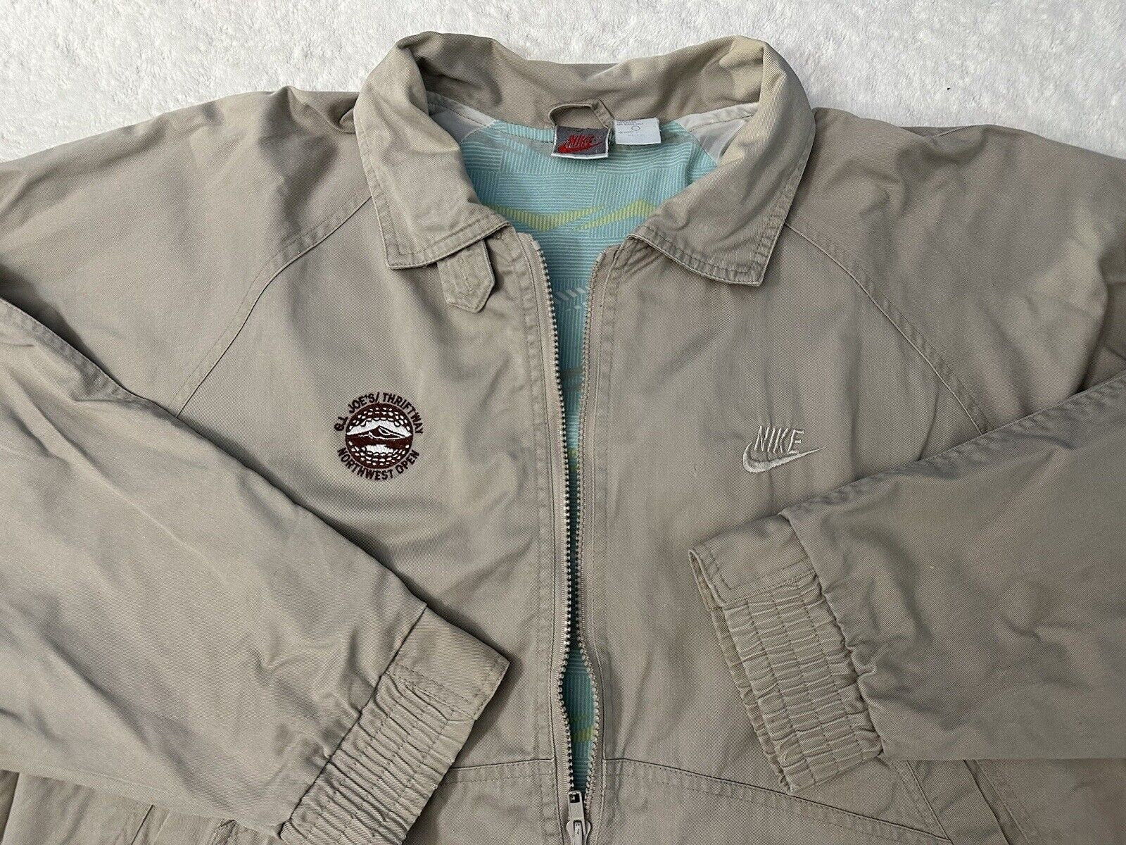 Vintage 1980s Nike GI Joe39s Thriftway Northwest Open Golf Event Jacket L XL Graphic Tee – Bold Style · Top Pick For Any Outfit