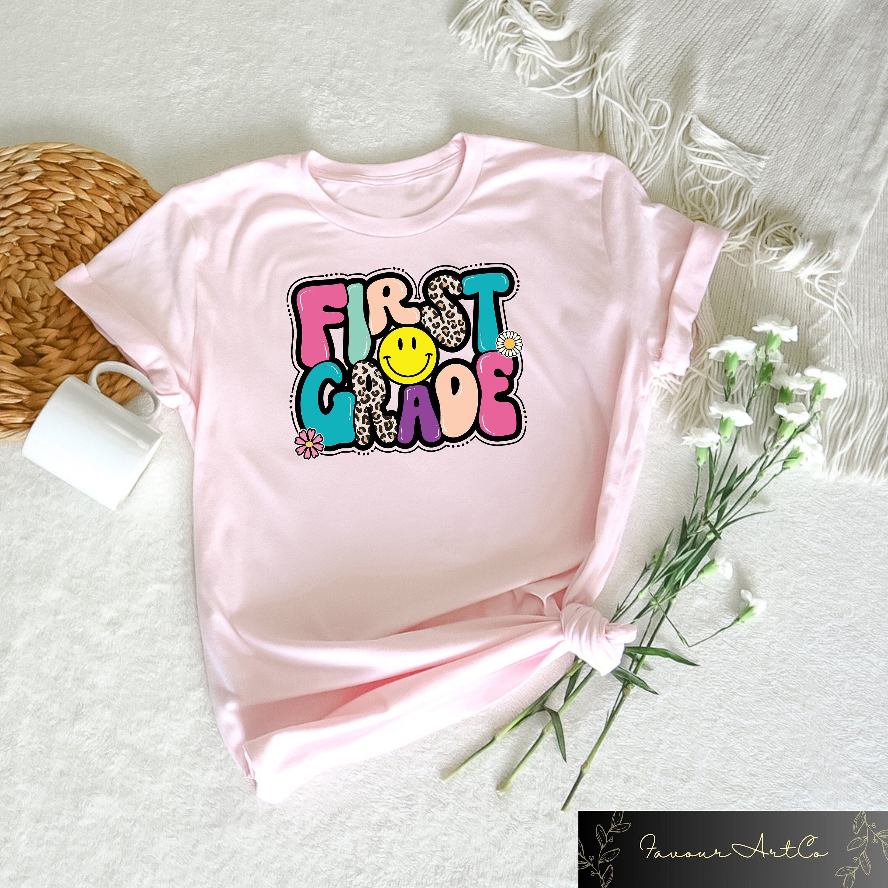 Hello First Grade Shirt Back To School Shirt Hello First Grade Rainbow Shirt First Grade Shirt First Grade Teacher Shirt1st Grade Shirt Graphic Tee – Premium Graphic · Trending Graphic Apparel