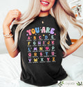Teacher Affirmation Shirt Alphabet Positivity Teaching Back To School Teacher Appreciation Gift Funny Teacher Custom Teacher Gift Graphic Tee – Aesthetic Look · Perfect For Daily Wear