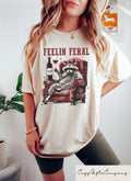 Feelin Feral Raccoon Shirt Funny Meme Raccoon T Shirt Feral Shirt Aesthetic Woman Clothing Funny Rodeo Shirt Graphic Tee – Fan Favorite · Perfect For Daily Wear