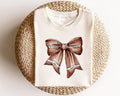 Football Bow Shirts Preepy Aesthetic TShirt Coquette Bow Gameday Football Coquette Bow Football Bow Shirts Graphic Tee – Aesthetic Look · Trending Graphic Apparel