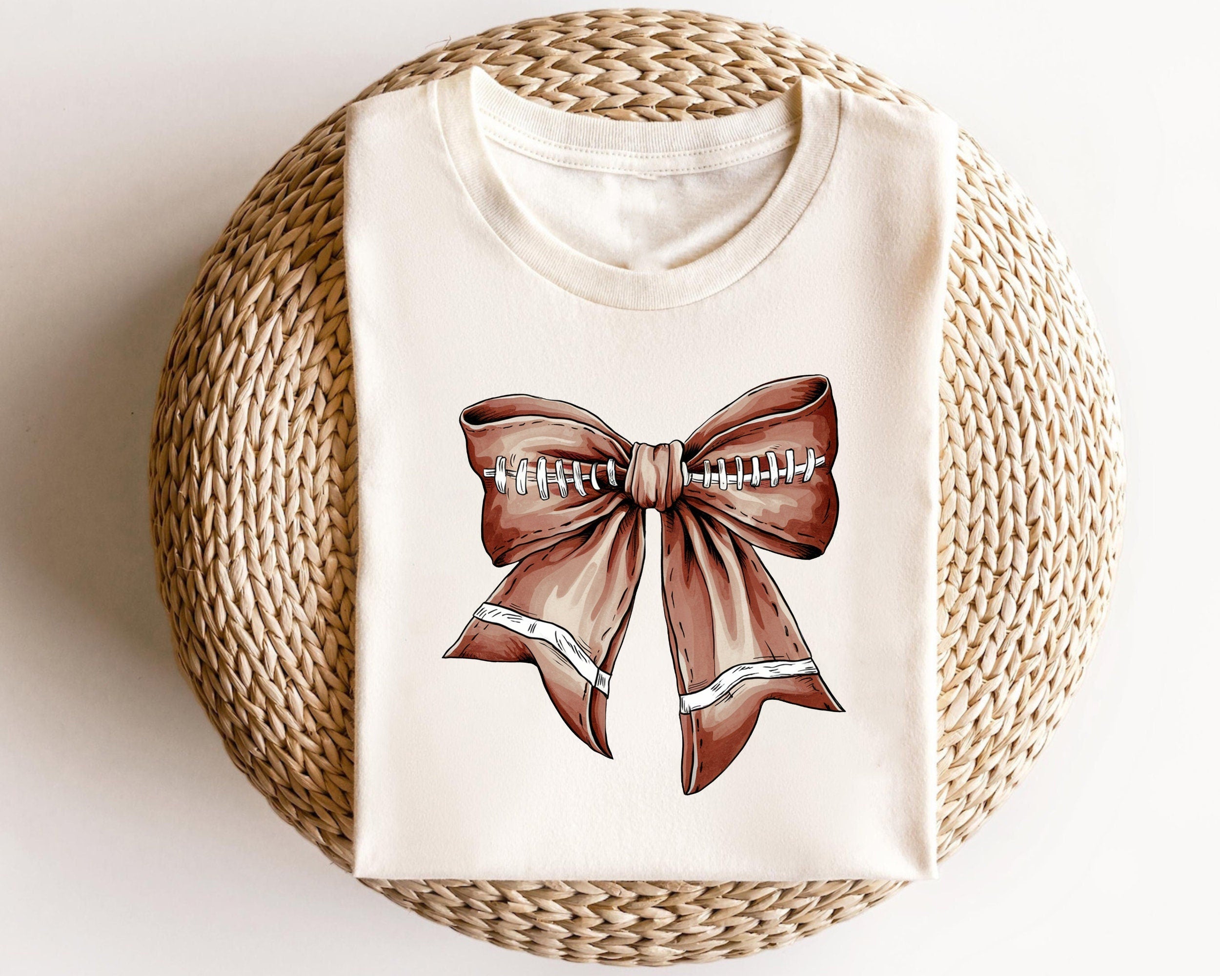 Football Bow Shirts Preepy Aesthetic TShirt Coquette Bow Gameday Football Coquette Bow Football Bow Shirts Graphic Tee – Aesthetic Look · Trending Graphic Apparel