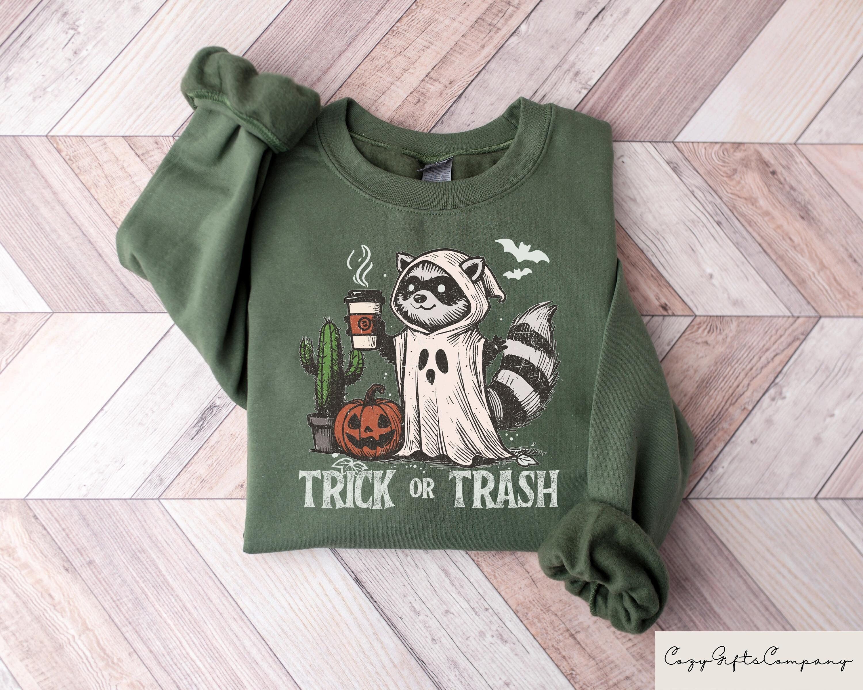 Trick Or Trash Sweatshirt Ghost Raccoon Drinking Coffee Tshirt Spooky Season Raccoon Tee Halloween Raccoon Tshirt Halloween Pumpkin Gift Sweatshirt – Feel-Good Design · High-Quality Print