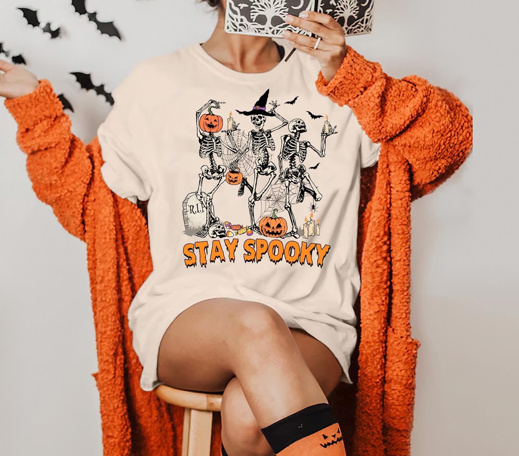 Stay Spooky Tshirt Dancing Skeleton Halloween Shirt Funny Skeletons with Pumpkin T shirt Trick or Treat T shirt Spooky Halloween Graphic Tee Graphic Tee – Aesthetic Look · Great Gift For Fans