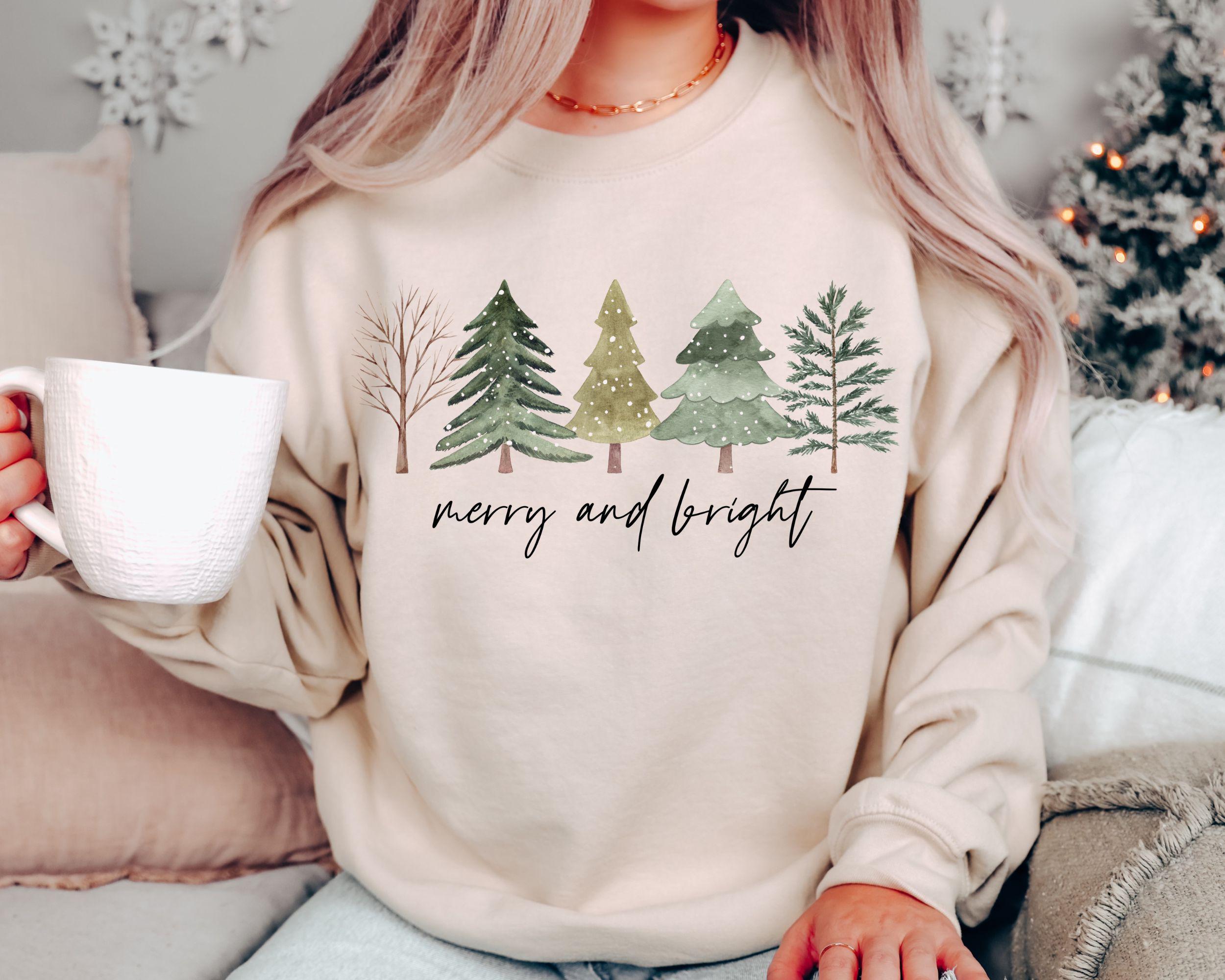 Merry and Bright Trees Women39s Christmas Sweatshirt Womans Holiday Shirt Christmas GiftChic Winter ShirtCute Holiday TeeChristmas Tree Sweatshirt – Cozy Vibes · Must-Have Style