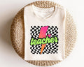Retro Teacher Shirts Checkered Teacher TShirt Neon Teacher Back to School Neon Teacher Retro Teacher Shirts Graphic Tee – Warm & Stylish · Must-Have Style
