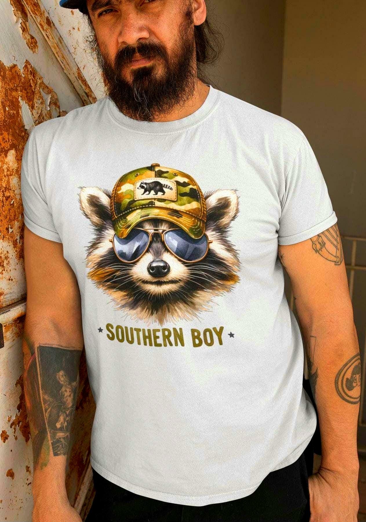 Raccoon Graphic Tee Graphic Southern Boy Shirt Cute Animal Lover Gift Unisex T Shirt Wildlife Nature Shirt Humorous Tee Graphic Tee Graphic Tee – Premium Graphic · High-Quality Print
