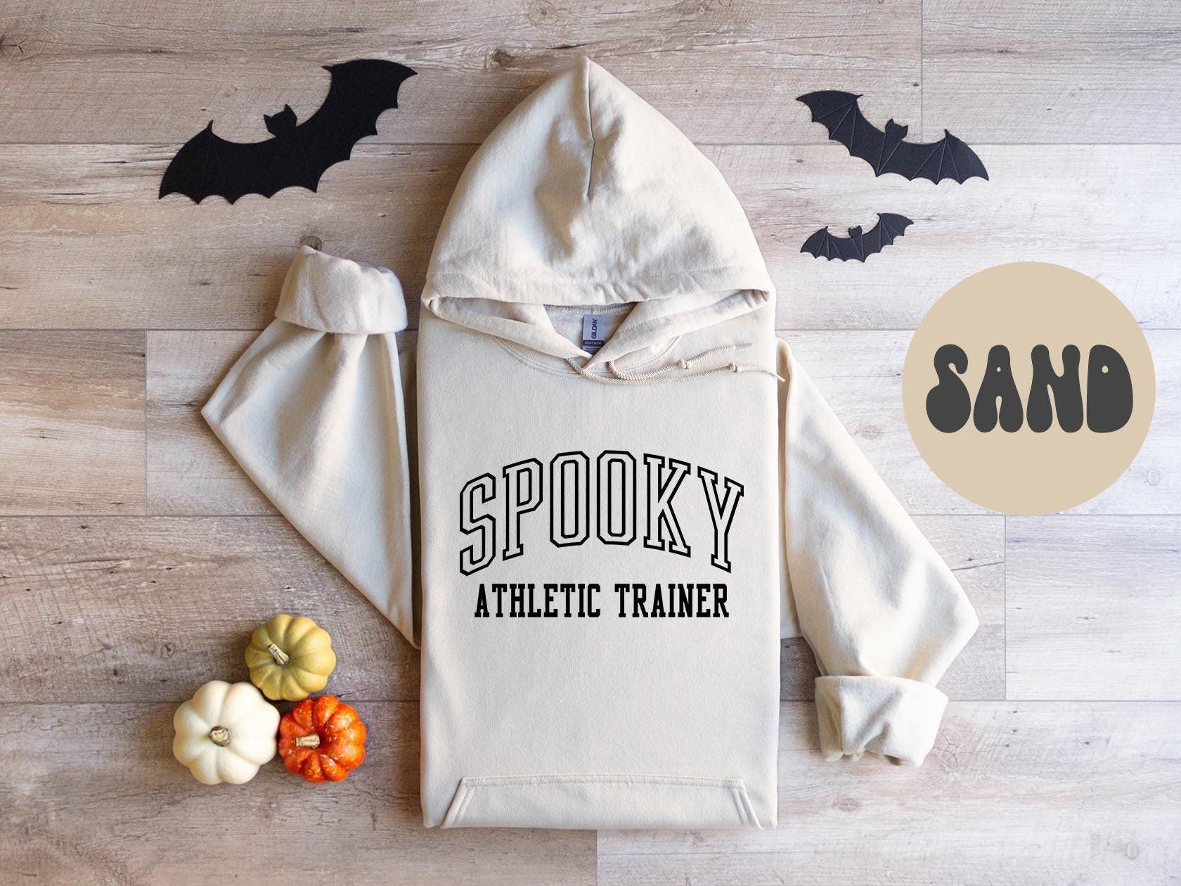 Athletic Trainer Spooky Halloween Fall Autumn Hoodie Gifts Hooded Sweatshirt Jumper Long Sleeve Birthday Gift for Men Gift for Women Hoodie – Warm & Stylish · Must-Have Style