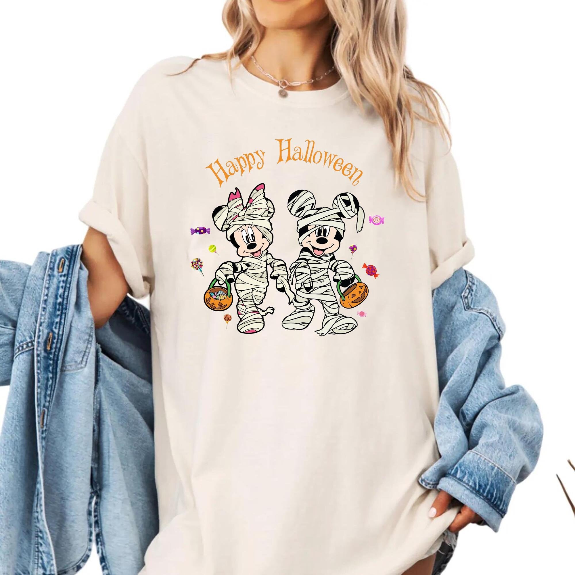 Mickey mummy shirt Minny mummy t shirt Mickey and minnie halloween tee Disney halloween gift shirt Funny halloween tee Disney trip tee Graphic Tee – Soft Feel · Trending Graphic Apparel