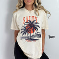 Christian Beach Shirt Salty Salt of the Earth Christian Surf Tee Ocean Christian Gift Bible Verse Faith Religious Graphic Tee – Aesthetic Look · Perfect For Daily Wear