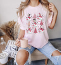 Disney Pink Christmas Shirt Mickey and Friends Festive Holiday Tee Matching Family Christmas T shirt Gift for Holiday Party and Disney Lover Graphic Tee – Soft Feel · Perfect For Daily Wear