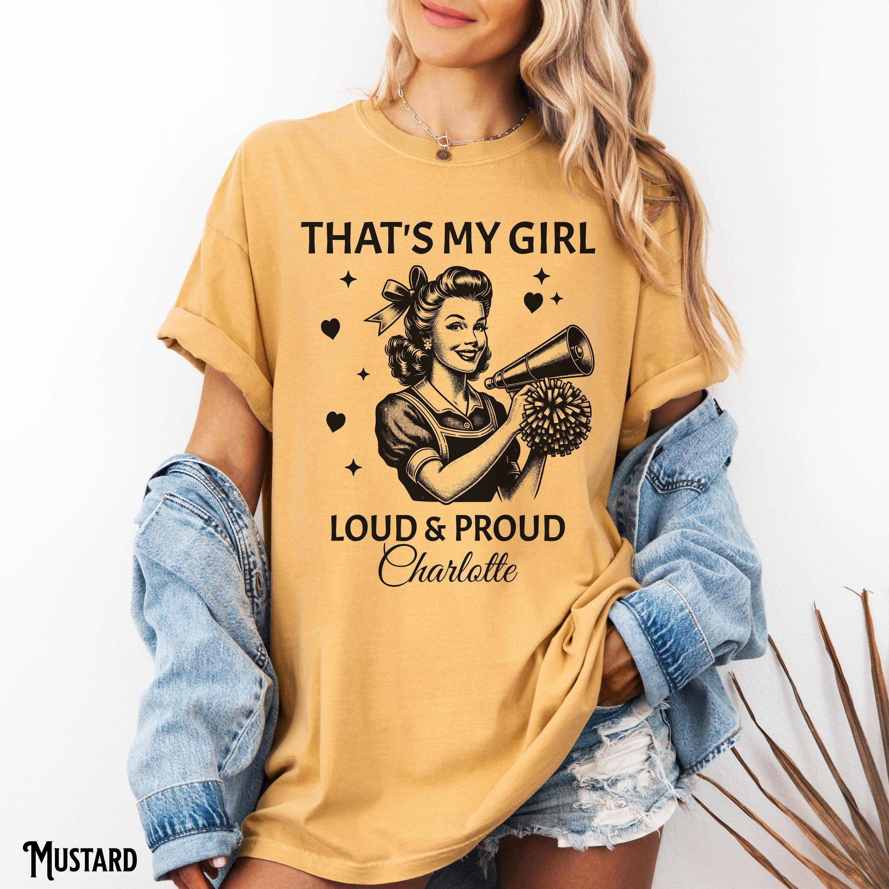 Personalized Custom That39s My Girl Cheer Mom Shirt Loud and Proud Vintage Retro Cheerleading Competition Graphic Tee – Cozy Vibes · Trending Graphic Apparel