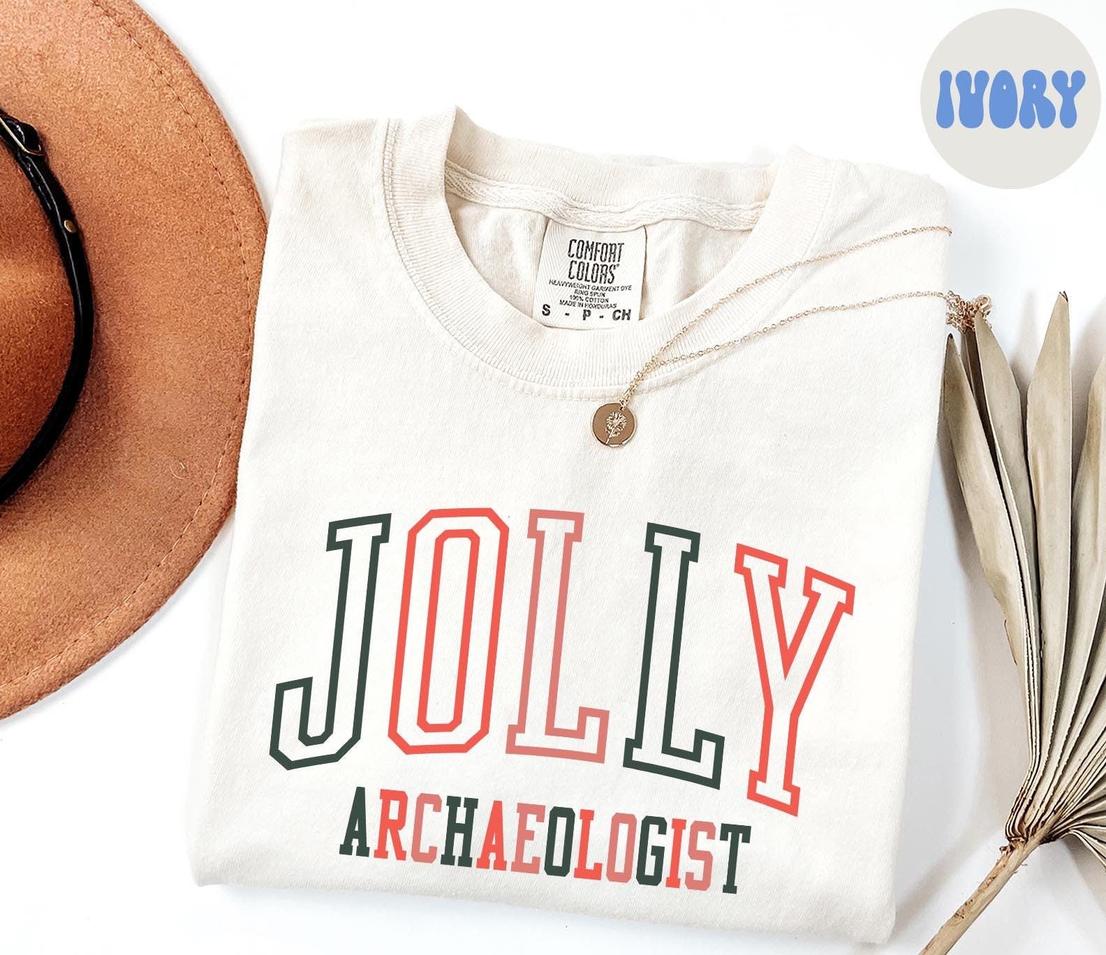 Archaeologist Christmas Shirt Archaeology Shirt Gifts Comfort Colors Cozy Holiday Tshirt Crewneck Tee Women Graphic Tee – Warm & Stylish · Trending Graphic Apparel