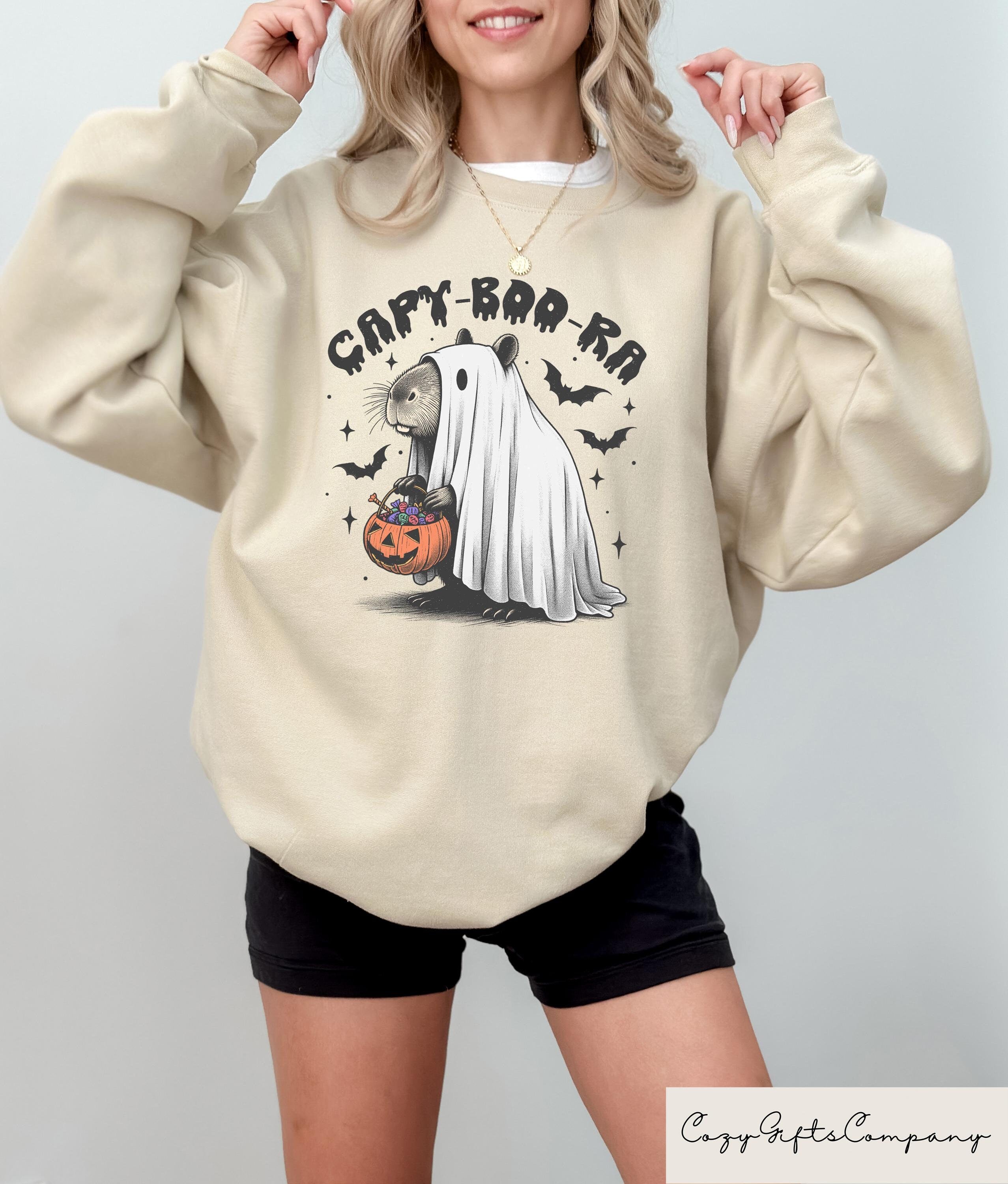 Capy Boo Ra Halloween Sweatshirt Trick Or Treat Capybara Shirt Halloween Vibes T Shirt Spooky Season Gift Halloween Ghost Crewneck Sweatshirt – Premium Graphic · Must-Have Style