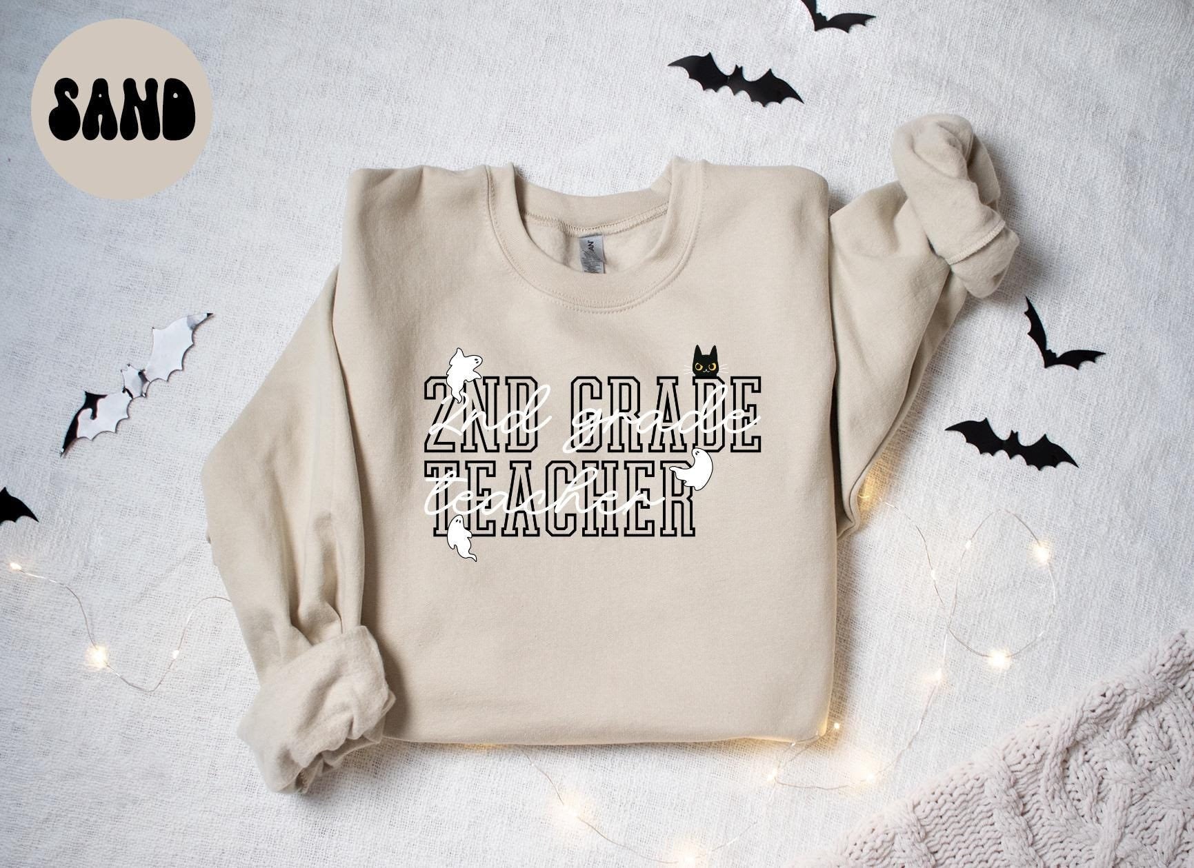 2nd Grade Teacher Halloween Ghost Cat Sweatshirt Gifts for Her Funny Sweater Shirt Cozy Comfy Unique Sweatshirt – Soft Feel · Trending Graphic Apparel