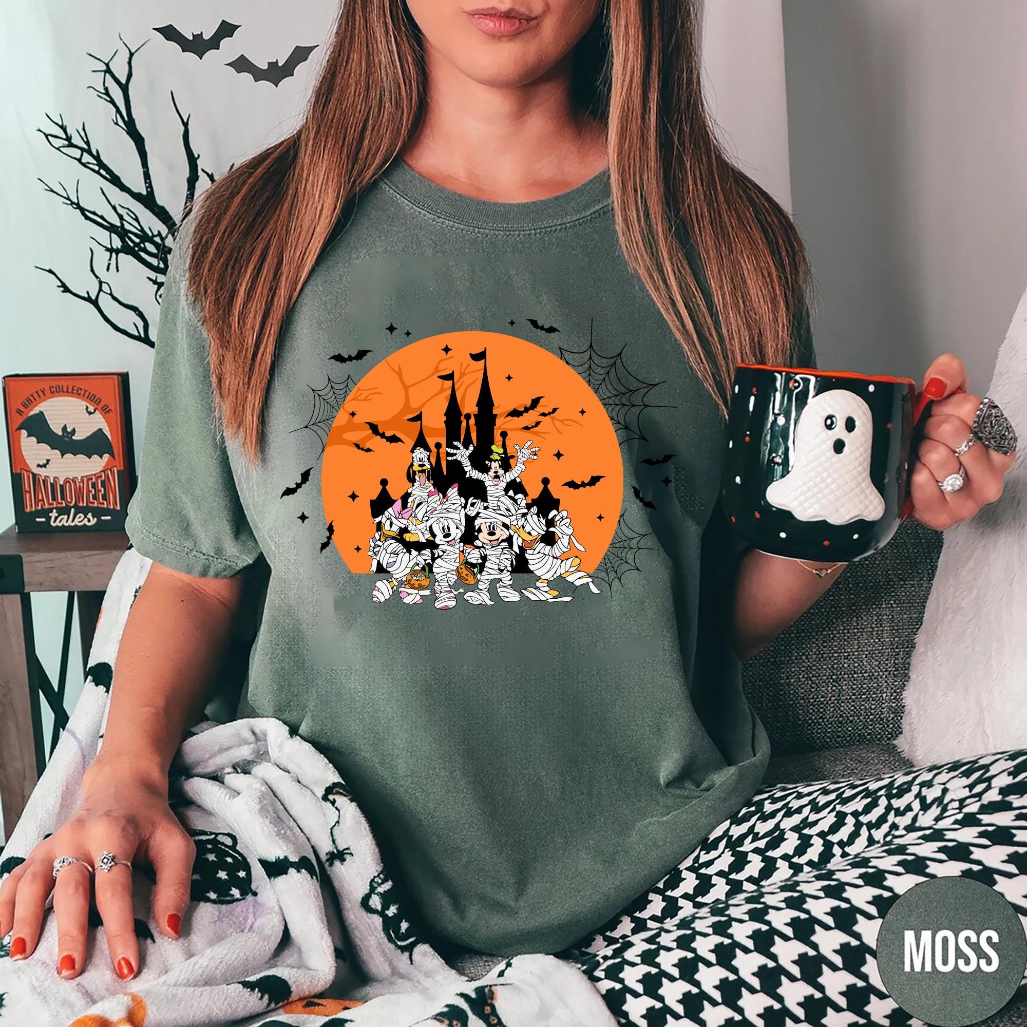 Disney Halloween Mummy T Shirt Mickey Minnie Goofy Donald and Daisy in Mummy Shirt Spooky Disney Castle Tee Halloween Gift for Disney Fans Graphic Tee – Warm & Stylish · Trending Graphic Apparel