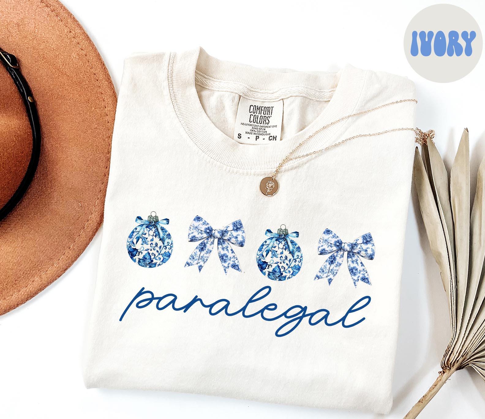Paralegal Christmas Shirt Paralegal Shirt Gifts Chinoiserie Coquette Shirt Comfort Colors Tshirt Crewneck Tee Women Graphic Tee – Warm & Stylish · Trending Graphic Apparel