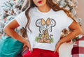 Minnie Mouse Christmas Castle T Shirt Gingerbread Castle with Minnie Ears Tee Disney Holiday Shirt for Christmas Gift for Winter Celebration Graphic Tee – Aesthetic Look · Trending Graphic Apparel