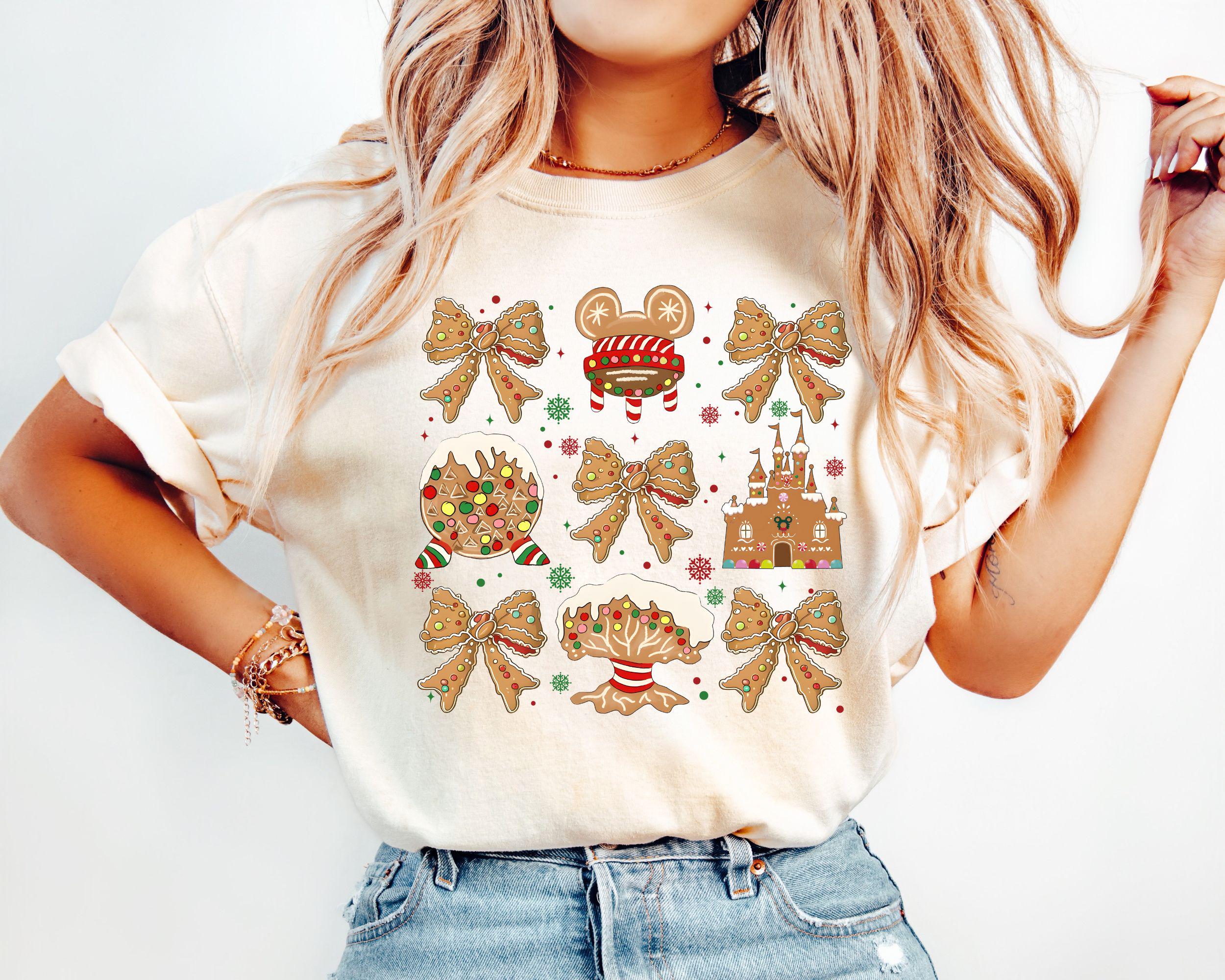 Walt Disney World Coquette Bows Gingerbread Christmas Shirt DisneyWorld Tour Xmas Tee Mickey39s Very Merry Xmas Party Hollywood Studio Tee Graphic Tee – Soft Feel · Trending Graphic Apparel