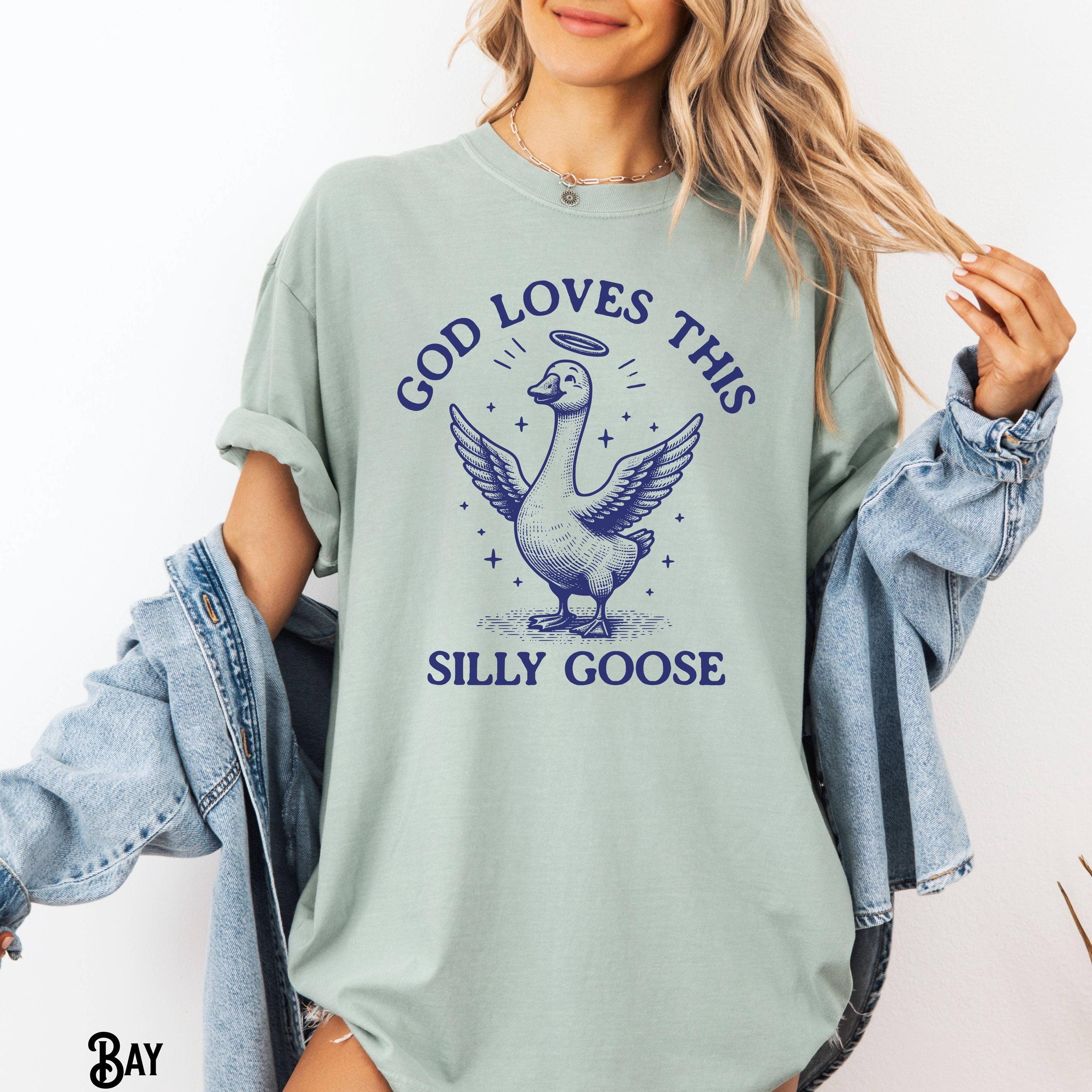 Christian God Loves This Silly Goose Y2K Meme Funny Trendy Animal Sayings Faith Silliest Goose Retro 9039s Gift Graphic Tee – Easygoing Wear · Trending Graphic Apparel