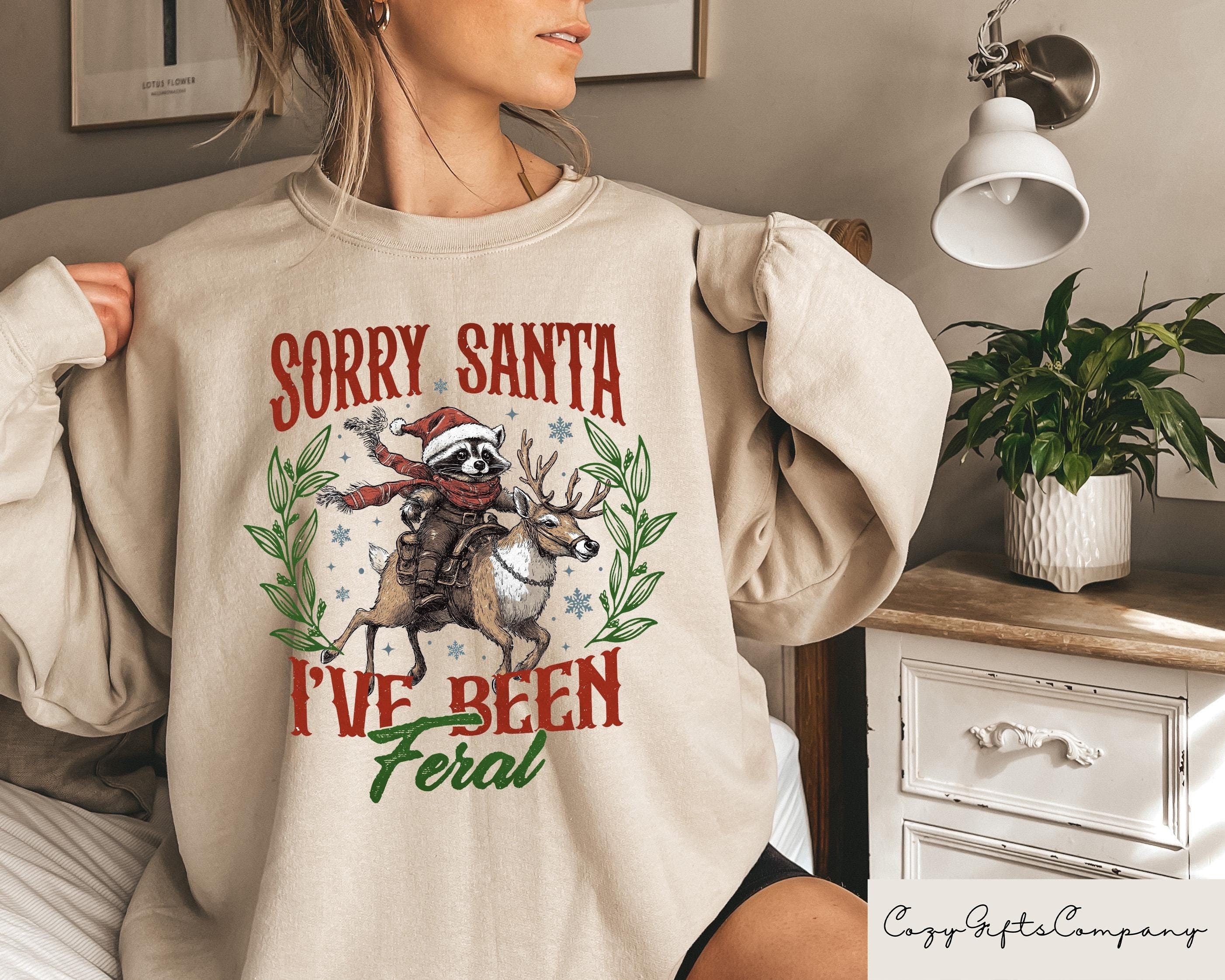 Sorry Santa I39ve Been Feral Sweatshirt Funny Christmas Shirt Christmas Feral Raccoon Sweater Christmas Gifts Funny Raccoon Meme Hoodie Hoodie – Warm & Stylish · Great Gift For Fans