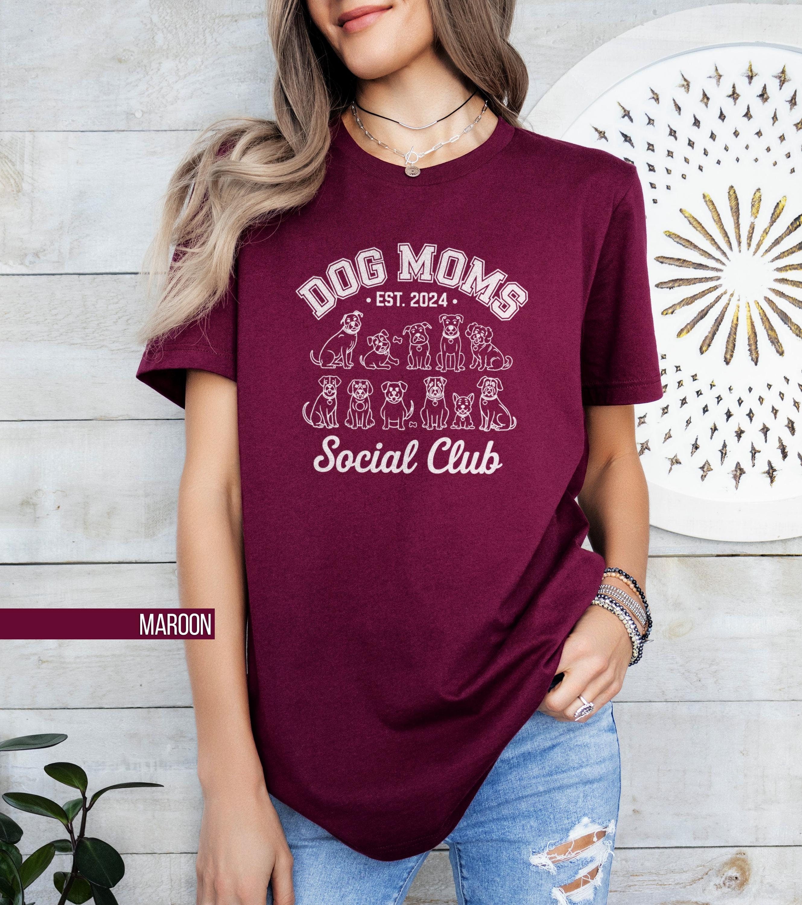 Dog Moms Social Club T Shirt Funny Dog Lover Gift Cute Dog Graphic Tee Casual Wear Dog Mom Apparel Pet Owner Shirt Adorable Gift Idea Graphic Tee – Aesthetic Look · Trending Graphic Apparel