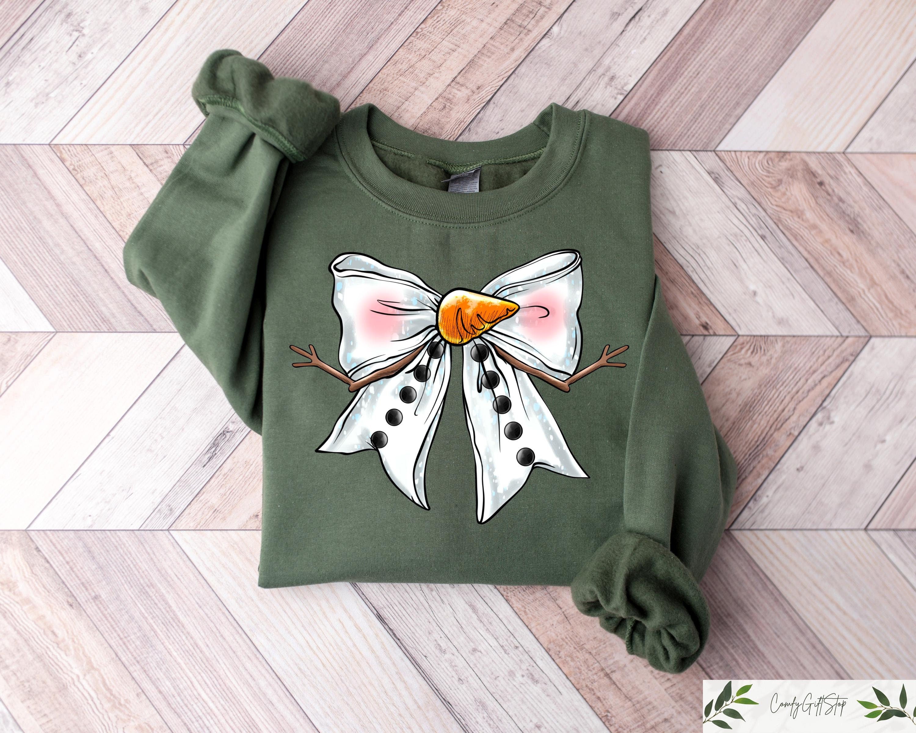 Coquette Snowman Bow Christmas Sweatshirt Cute Snowman Xmas Shirt Kids Christmas Gift Popular Holiday Crewneck Cute Women Christmas Gift Sweatshirt – Premium Graphic · Great Gift For Fans