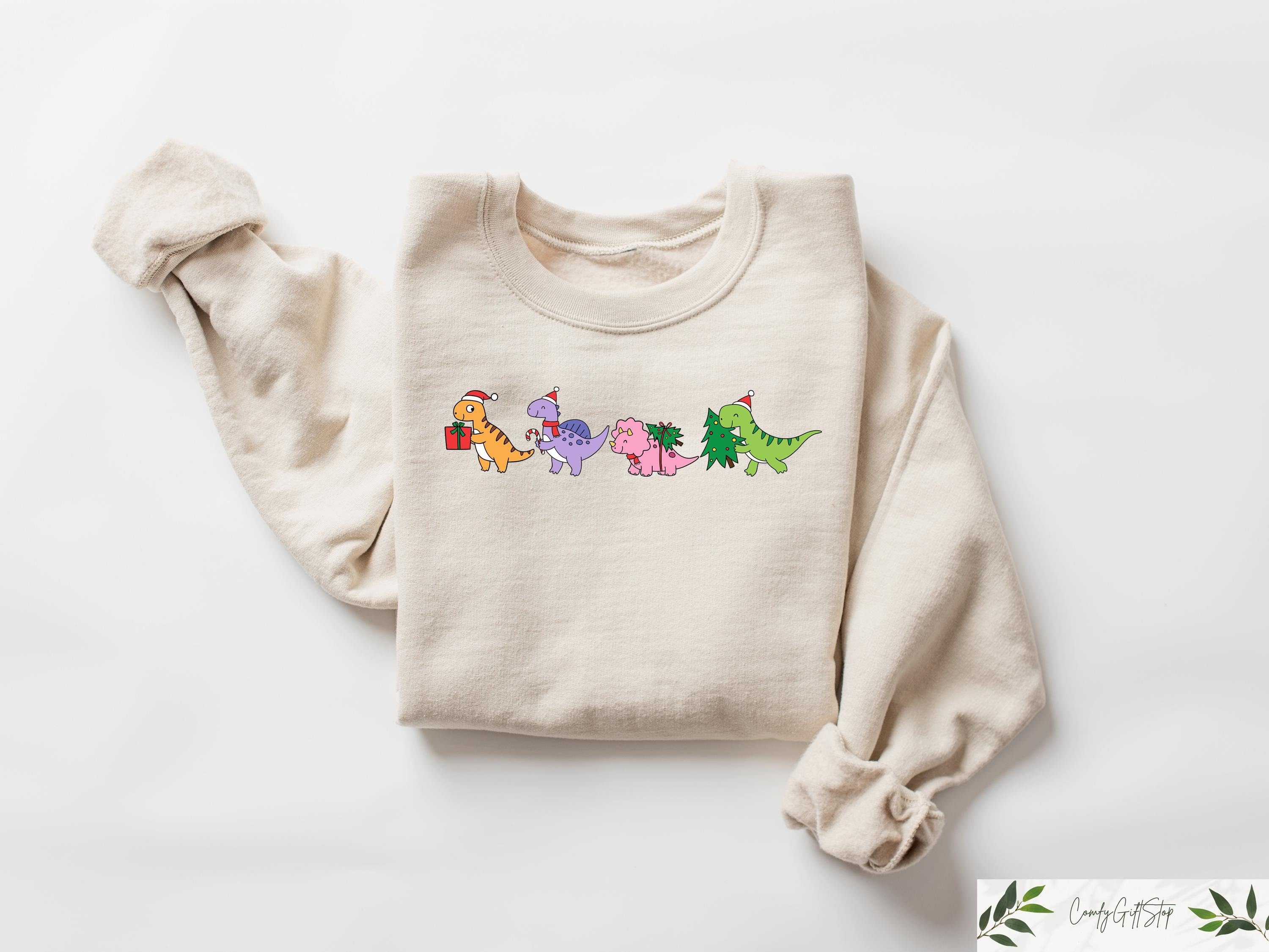 Dinosaurs Christmas Sweatshirt Merry Dinomas Sweater Dinosaur Lover Gift Cute Vibes Funny Dino Xmas I Believe in Santa and Dinosaurs Sweatshirt – Cozy Vibes · Trending Graphic Apparel