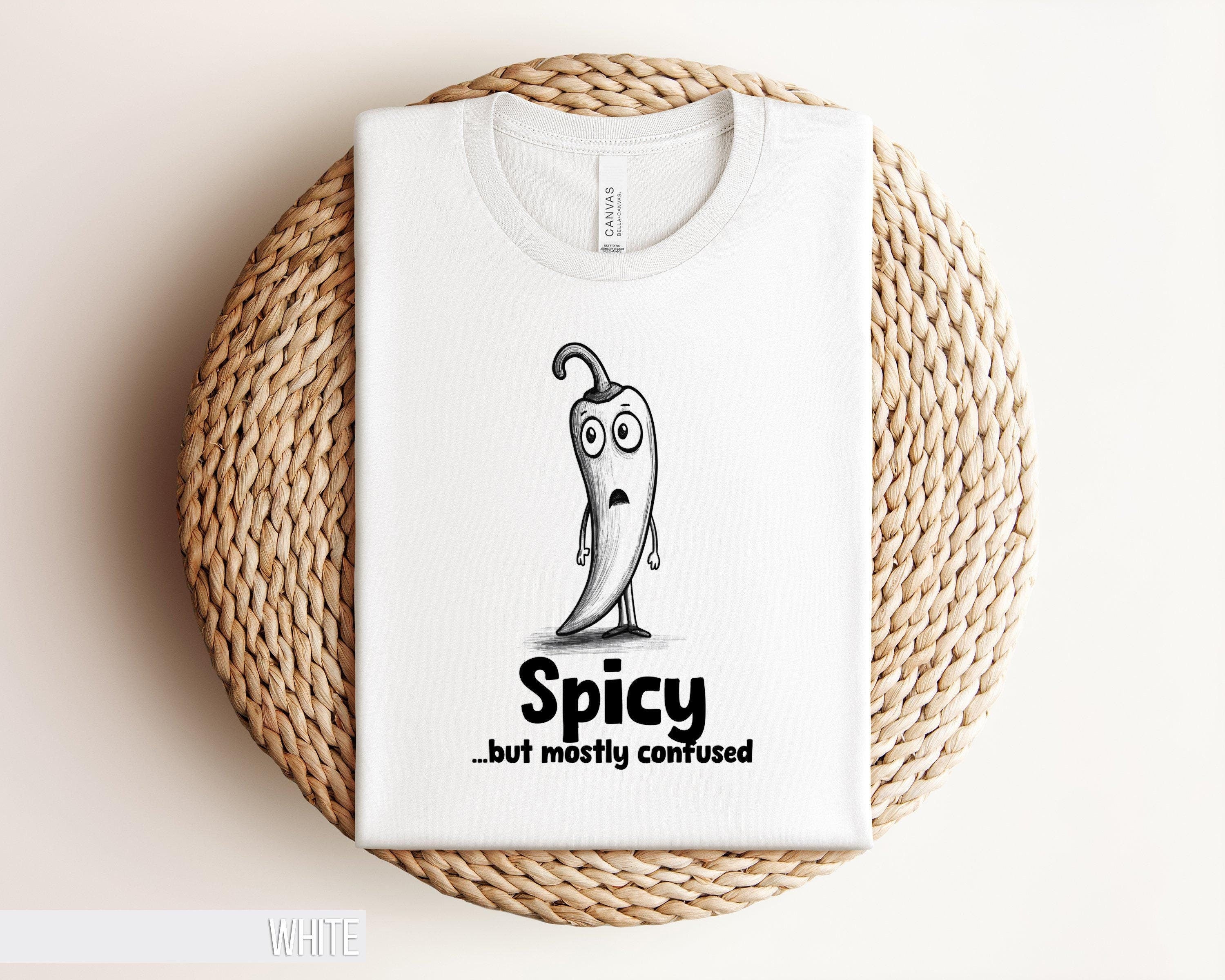 Funny Spicy Pepper T Shirt Mostly Confused Chili Character Tee Hilarious Hot Pepper Graphic Design Quirky Humor Shirt for All Ages Graphic Tee – Premium Graphic · Must-Have Style