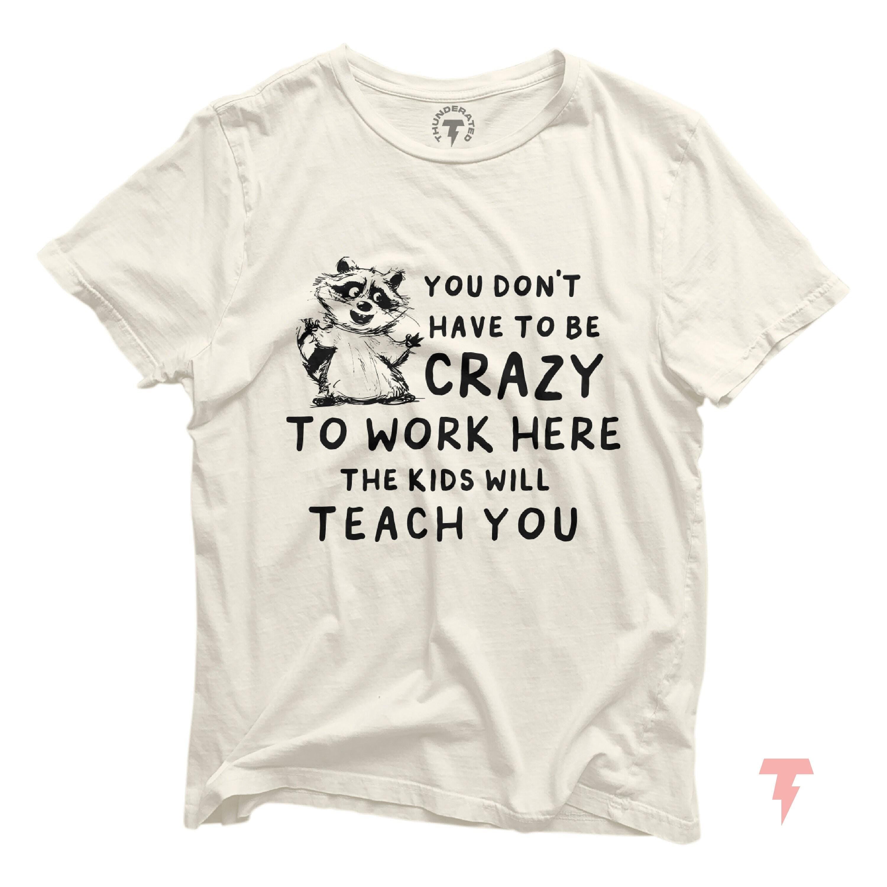 The Kids Will Teach You Crazy Funny Teacher Shirt Daycare Teacher Pre k teacher Teacher Life Raccoon Shirt Teacher Appreciation Gift Graphic Tee – Bold Style · Trending Graphic Apparel