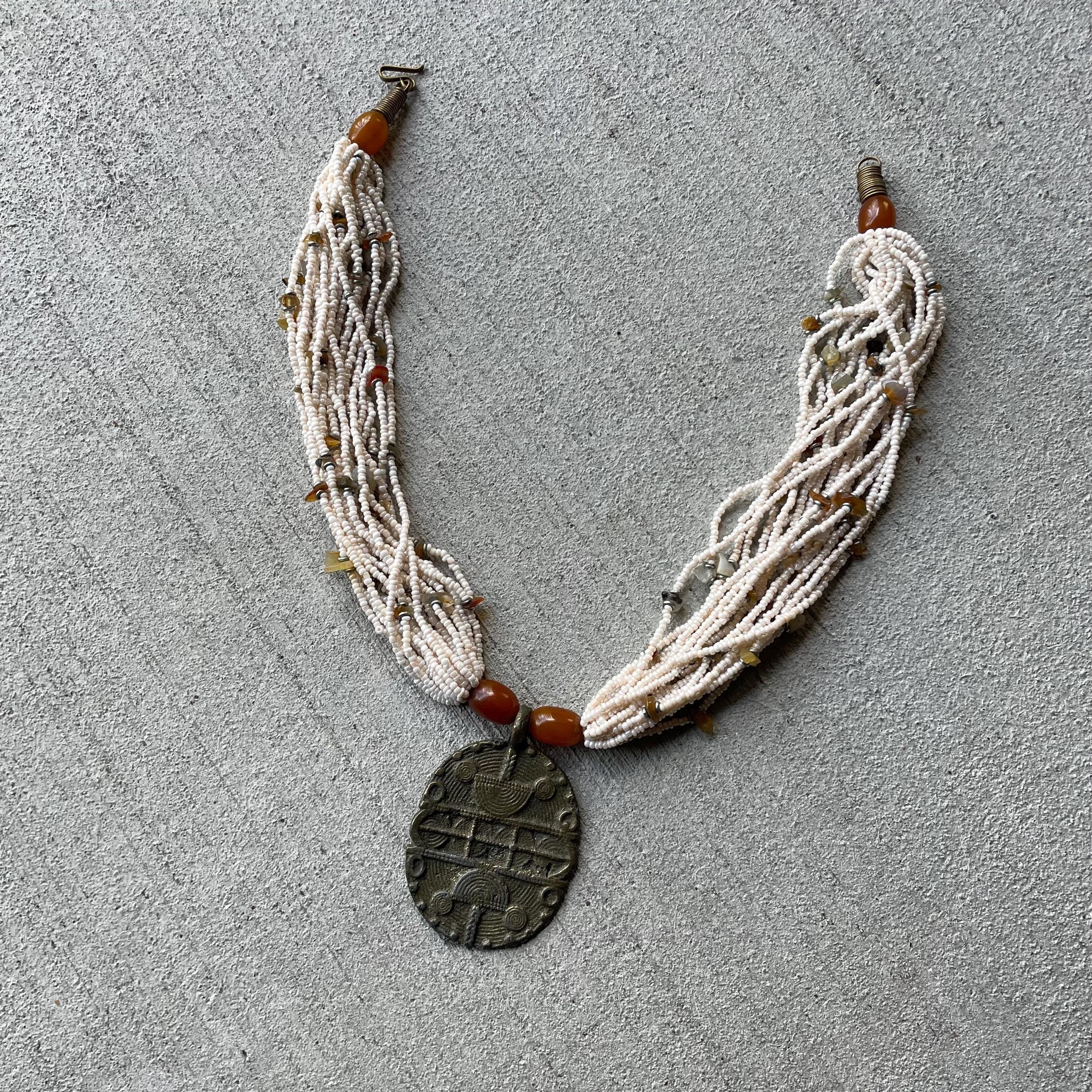 Vintage handmade beaded copper pendant necklace Graphic Tee – Warm & Stylish · Great Gift For Fans