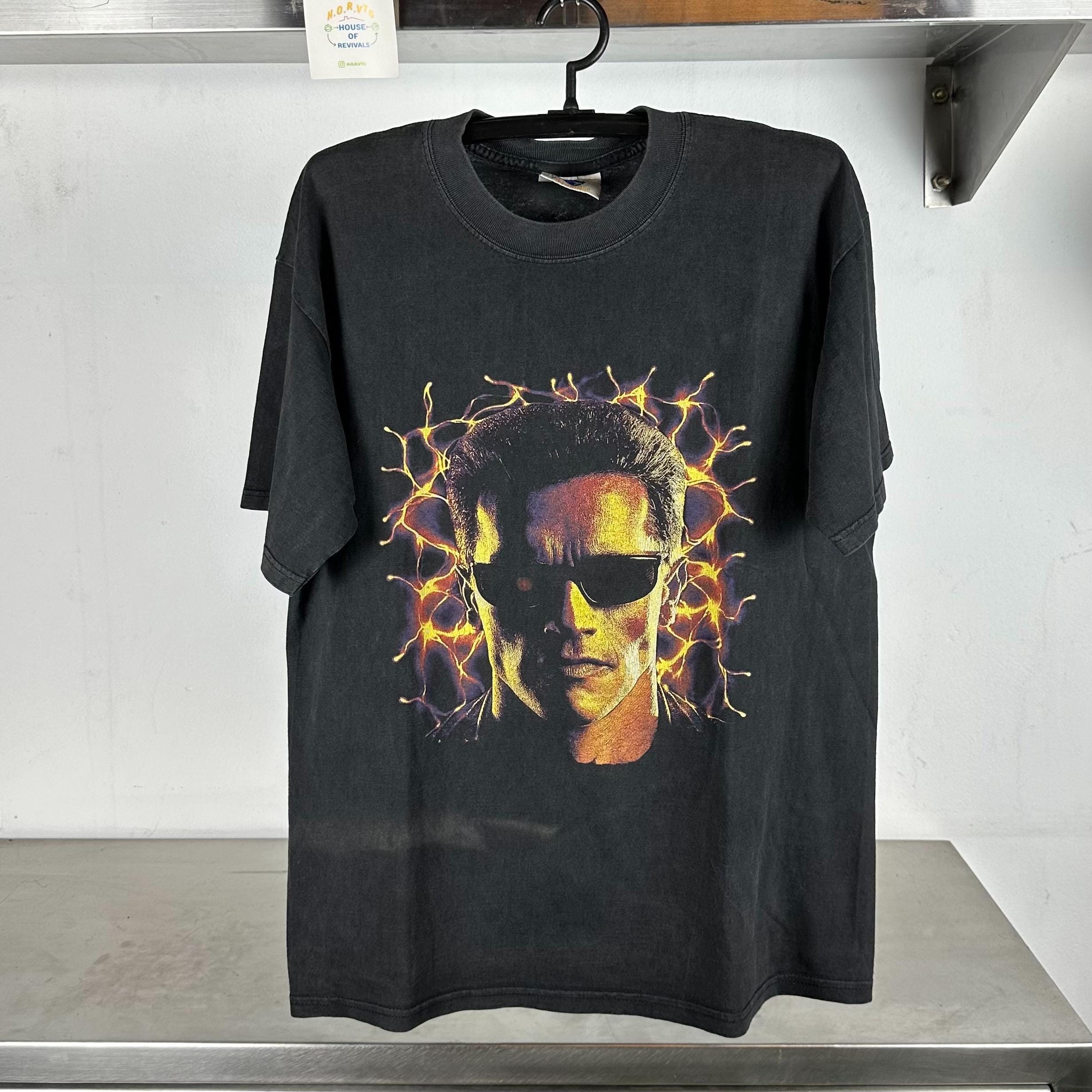 Vintage 90s Terminator 2 3D Universal Studios Arnold Schwarzenegger Movie Promo T shirt Movies Tees Vintage Terminator Universal Studios Graphic Tee – Premium Graphic · Trending Graphic Apparel