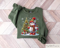 Christmas Snowman Sweatshirt Cute Snowman Sweater Christmas Tshirt For Women Cute Winter Hoodie Funny Christmas Gift Christmas Matching Hoodie – Warm & Stylish · High-Quality Print